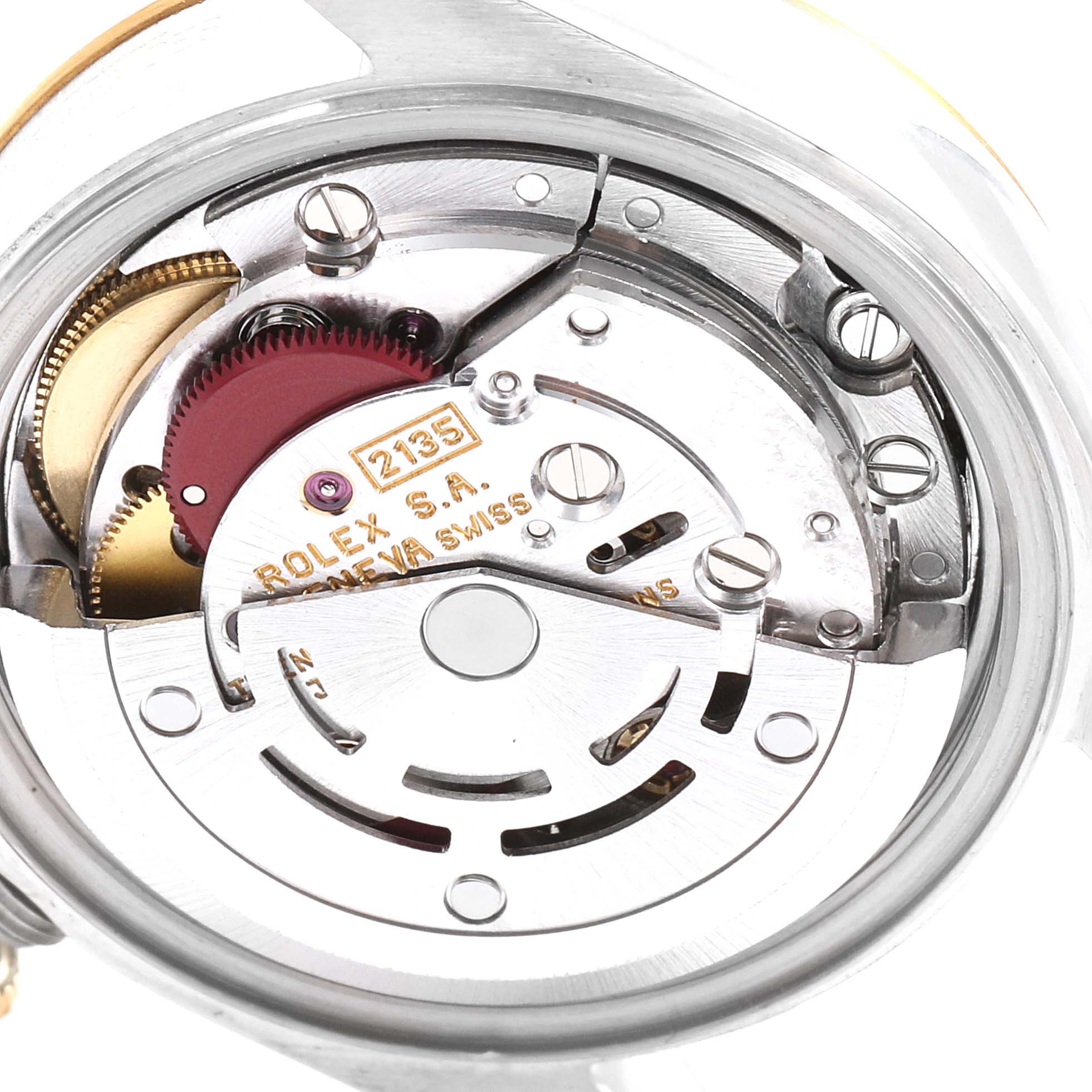 This image shows the inner mechanical movement of a Rolex Datejust 69173 Women
s Steel and Gold (two tone) Grey Dial 69173 Women
s Steel and Gold (two tone) Grey Dial watch, focusing on its gears and inscriptions.