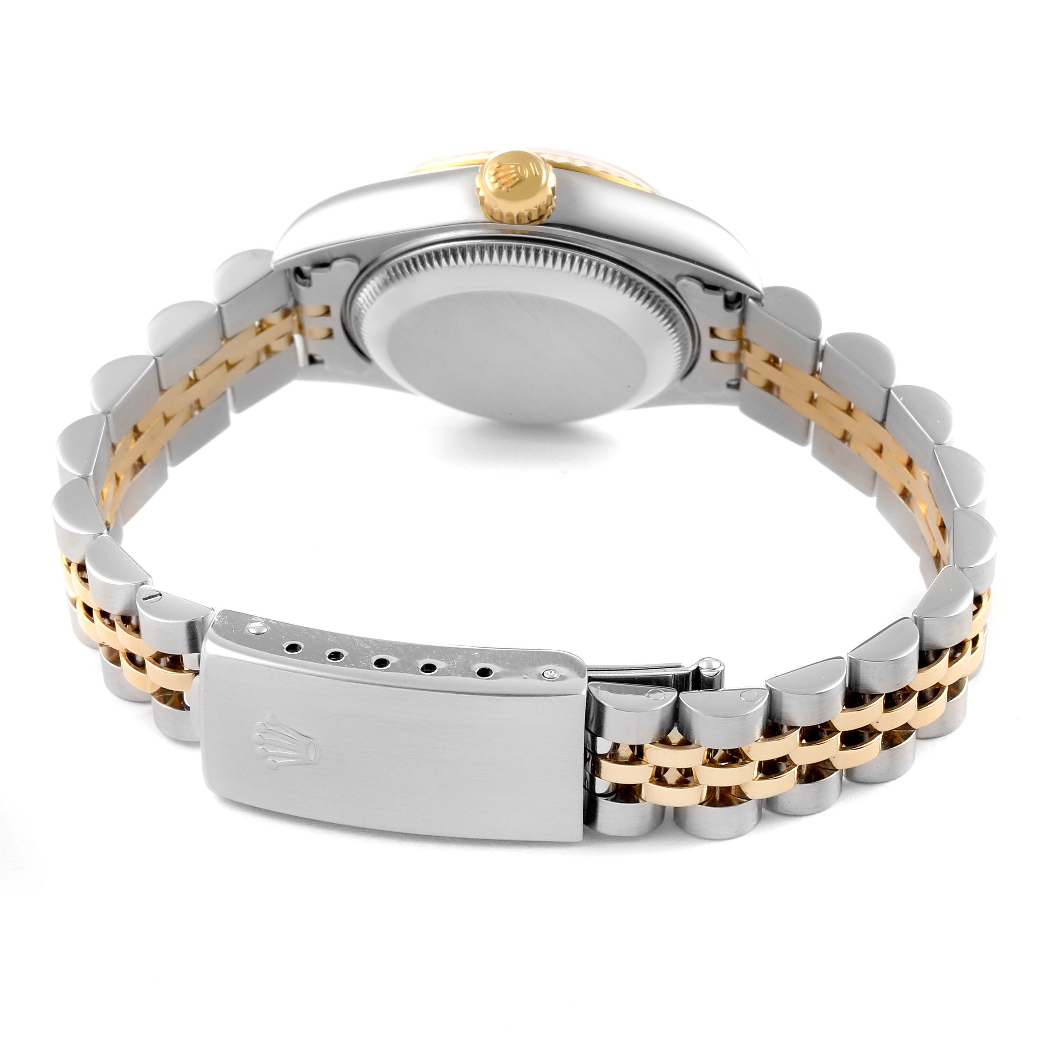 The image shows the back view of a Rolex Datejust 79173 Women's Steel and Gold (two tone) Silver Dial 79173 Women's Steel and Gold (two tone) Silver Dial watch, highlighting the case back, crown, and two-tone bracelet with a clasp.