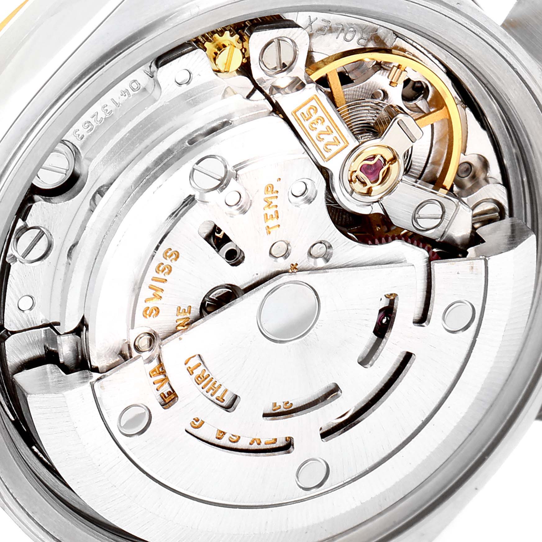 The image shows a close-up view of the movement and inner mechanics of a Rolex Datejust 79173 Women's Steel and Gold (two tone) Silver Dial 79173 Women's Steel and Gold (two tone) Silver Dial watch.