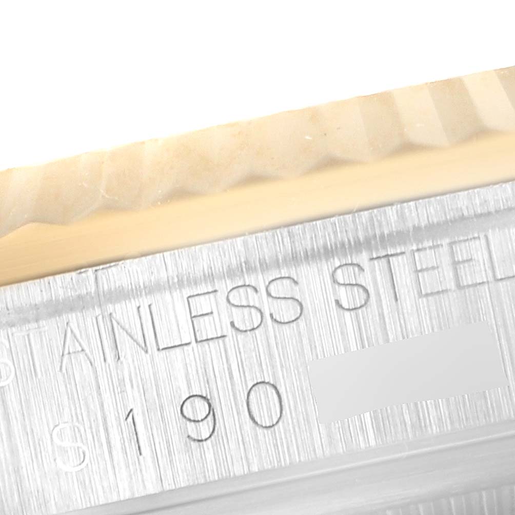 The image shows a close-up of the bezel and the brushed stainless steel case of the Rolex Datejust 16233 Men
s Steel and Gold (two tone) Grey Dial 16233 Men
s Steel and Gold (two tone) Grey Dial watch.