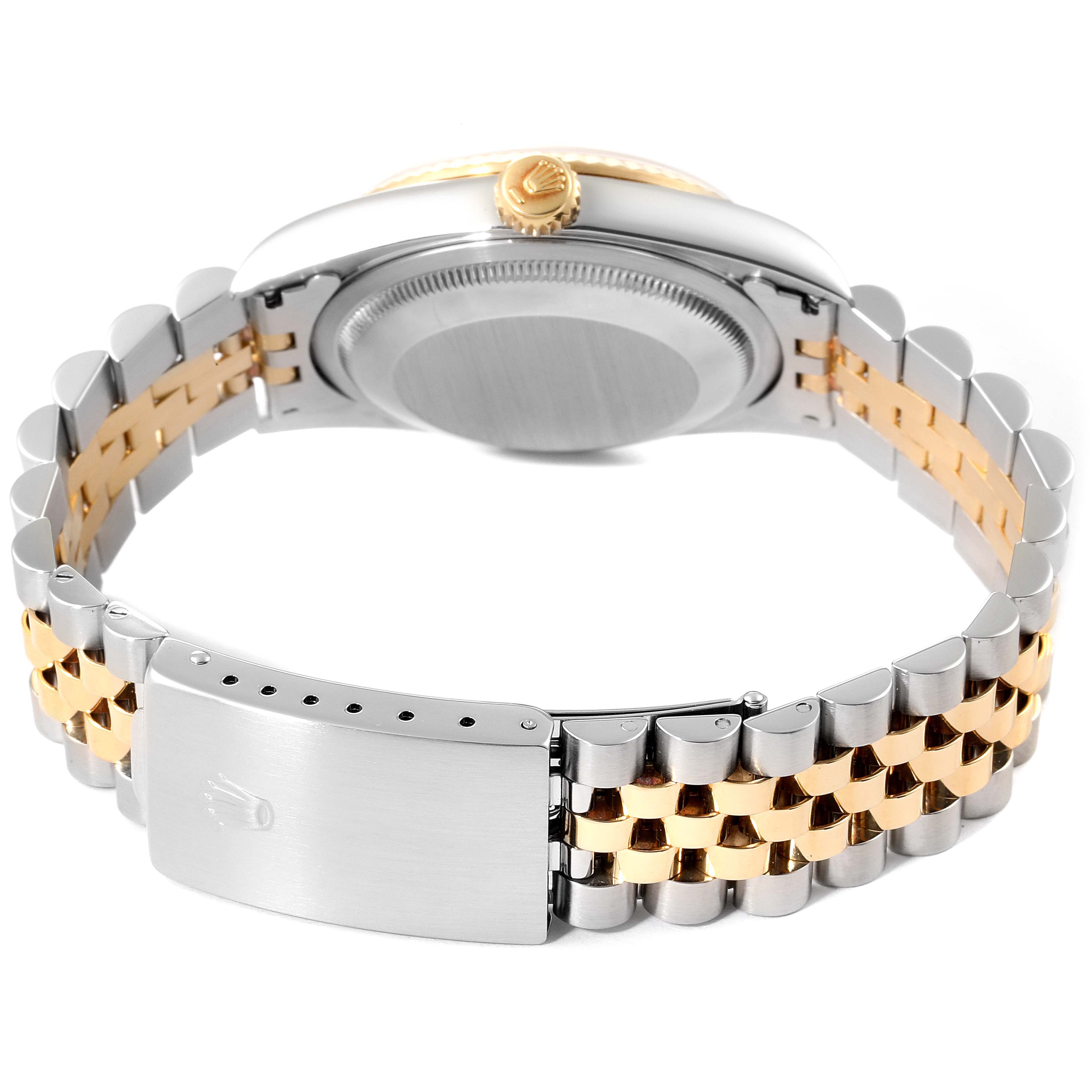 The image shows the back and side of a Rolex Datejust 16233 Men's Steel and Gold (two tone) Mother of Pearl Dial 16233 Men's Steel and Gold (two tone) Mother of Pearl Dial watch, featuring its case, crown, and bicolor bracelet.