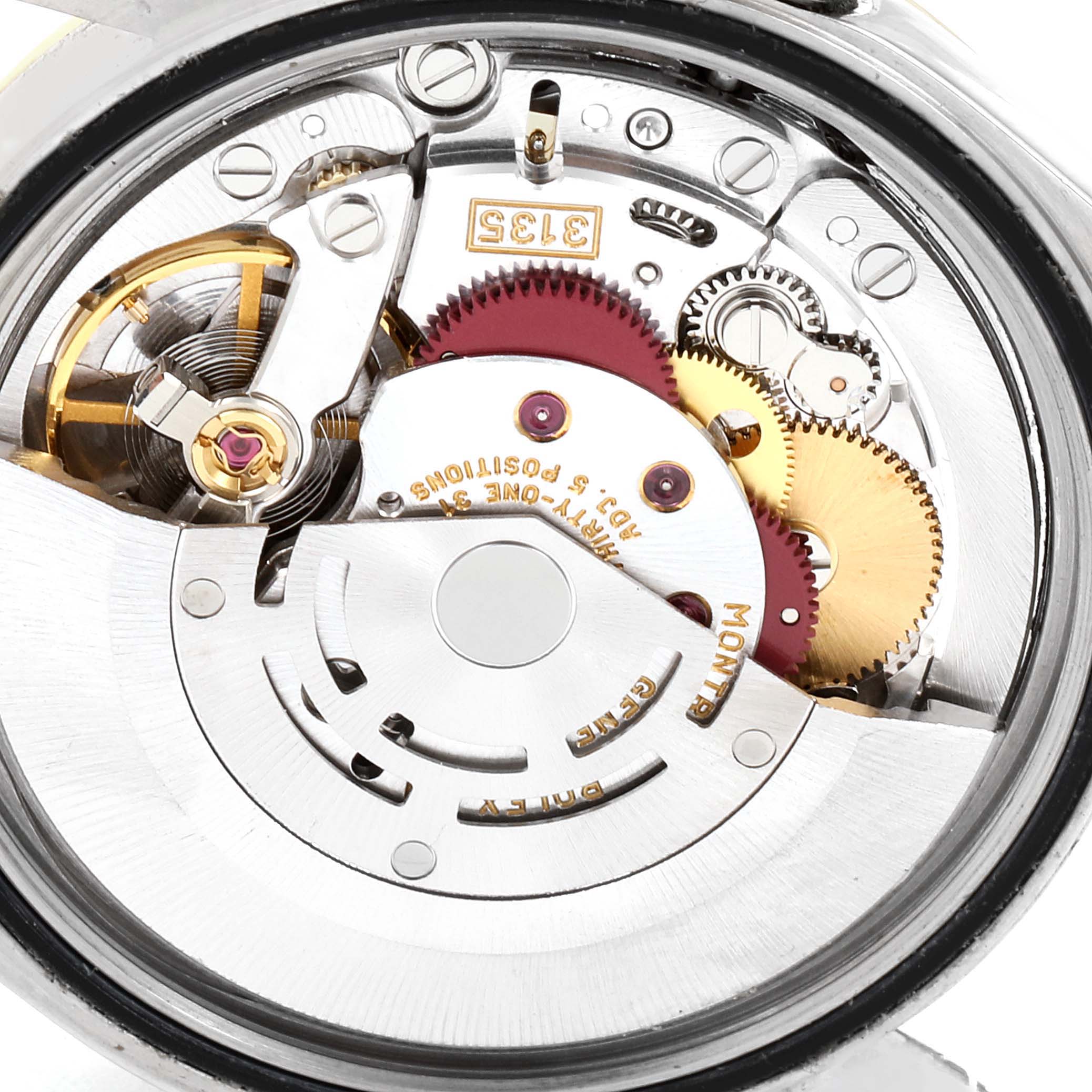 This image shows the movement and internal mechanics of a Rolex Datejust 16233 Men
s Steel and Gold (two tone) Grey Dial 16233 Men
s Steel and Gold (two tone) Grey Dial watch from a close-up angle.