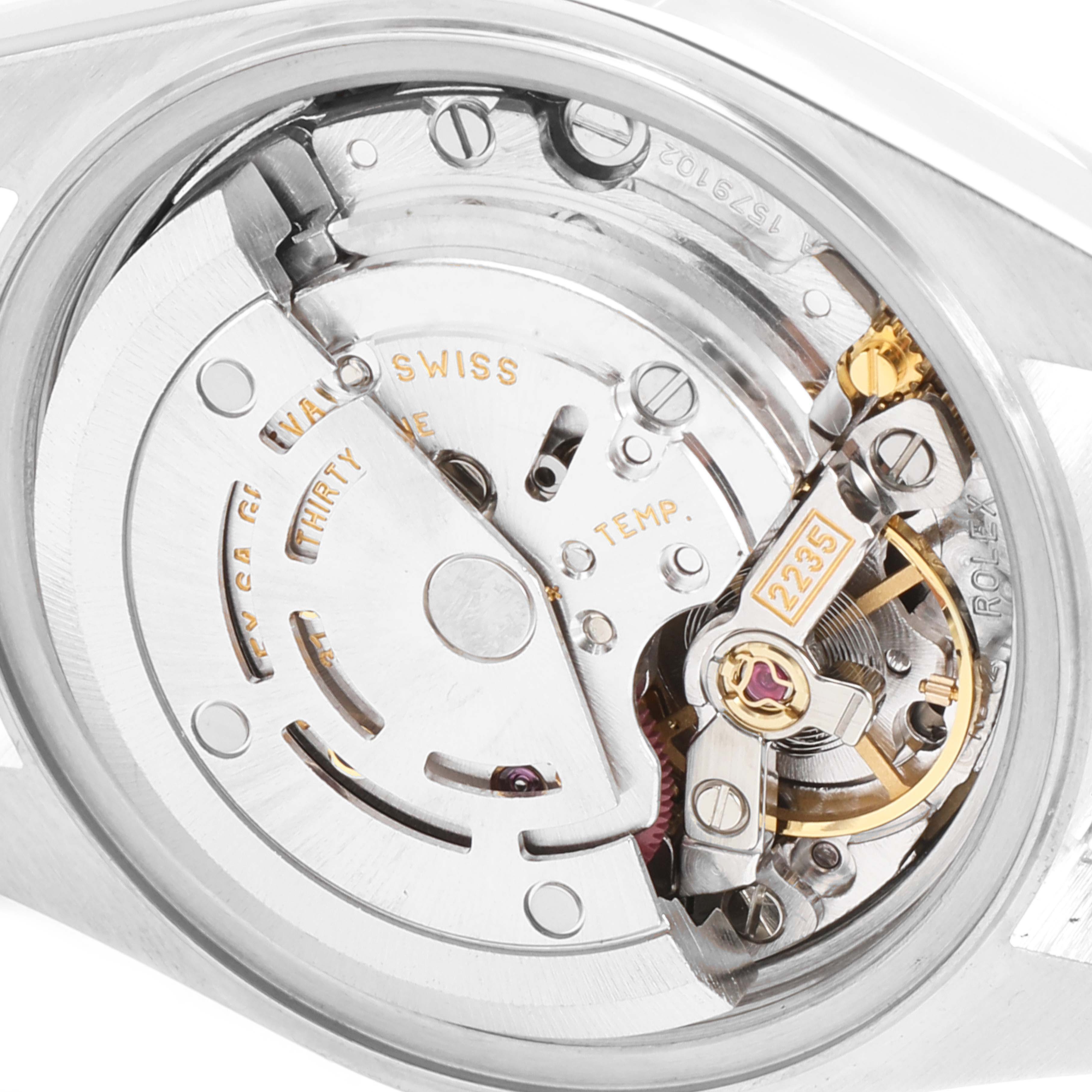 This is a close-up view of the Rolex Datejust 79173 Women's Steel and Gold (two tone) White Dial 79173 Women's Steel and Gold (two tone) White Dial watch movement mechanism from the back.