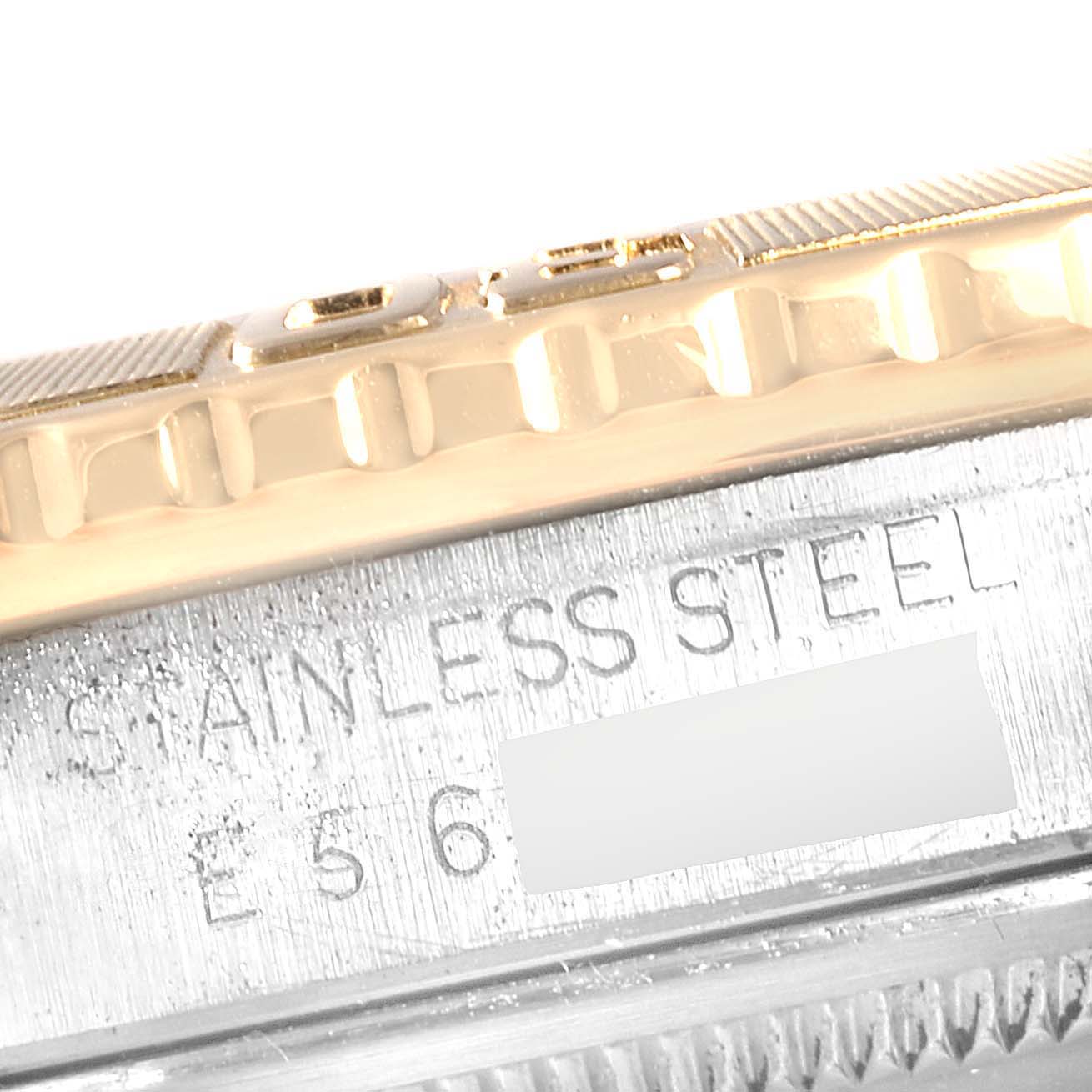 The image shows a close-up of the stainless steel side and bezel of a Rolex Turn-o-Graph 16263 Men
s Steel and Gold (two tone) Champagne Dial 16263 Men
s Steel and Gold (two tone) Champagne Dial watch.