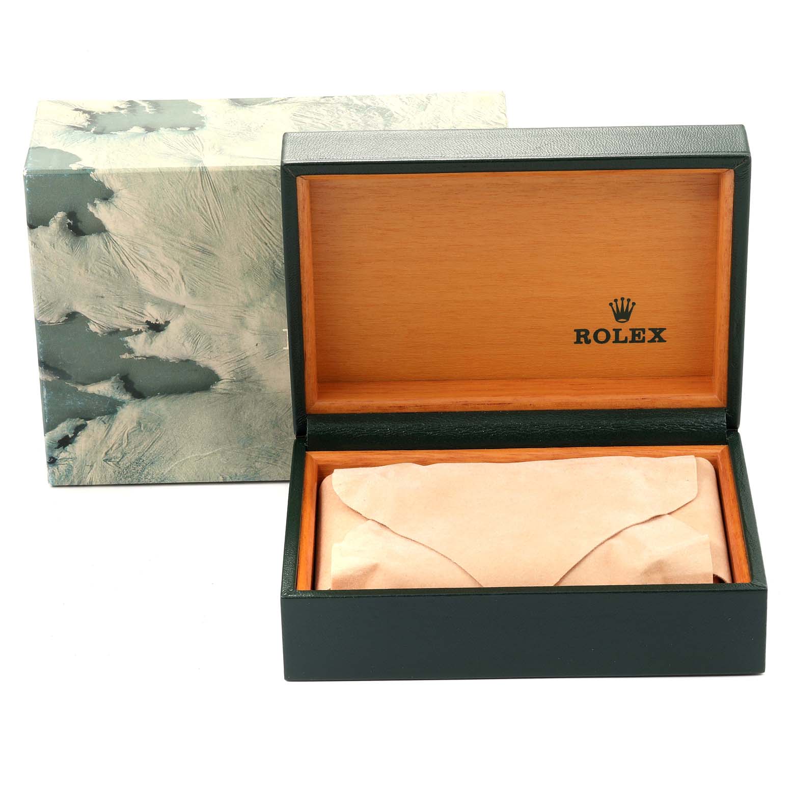 The image shows an open Rolex box with the packaging paper inside for the Turn-o-Graph model, with the outer box in the background.