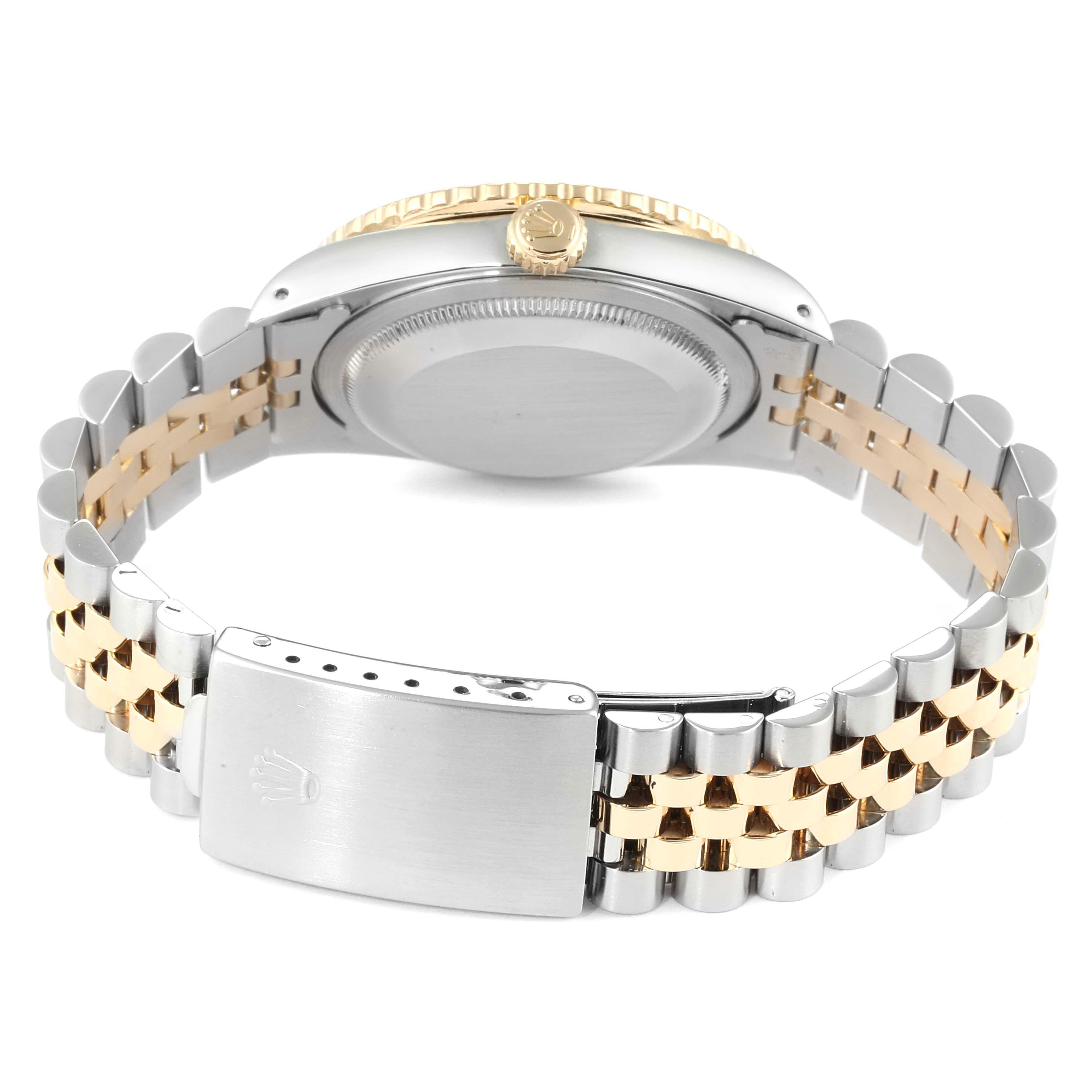 The image shows the Rolex Turn-o-Graph 16263 Men
s Steel and Gold (two tone) Champagne Dial 16263 Men
s Steel and Gold (two tone) Champagne Dial watch from the back, highlighting the case, crown, and two-tone bracelet with clasp.