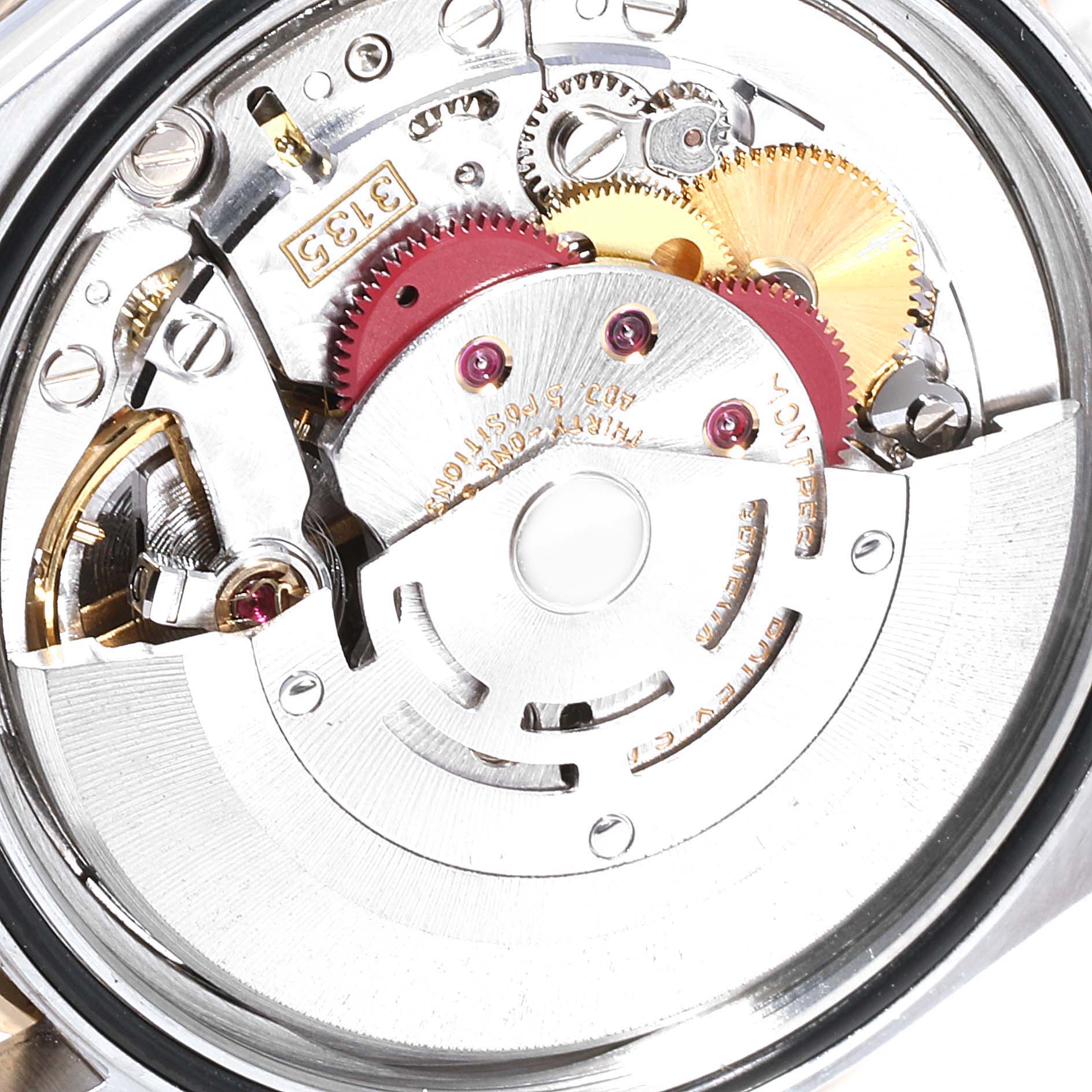 This image shows the internal mechanical components of a Rolex Turn-o-Graph 16263 Men
s Steel and Gold (two tone) Champagne Dial 16263 Men
s Steel and Gold (two tone) Champagne Dial watch, including gears and the rotor mechanism.