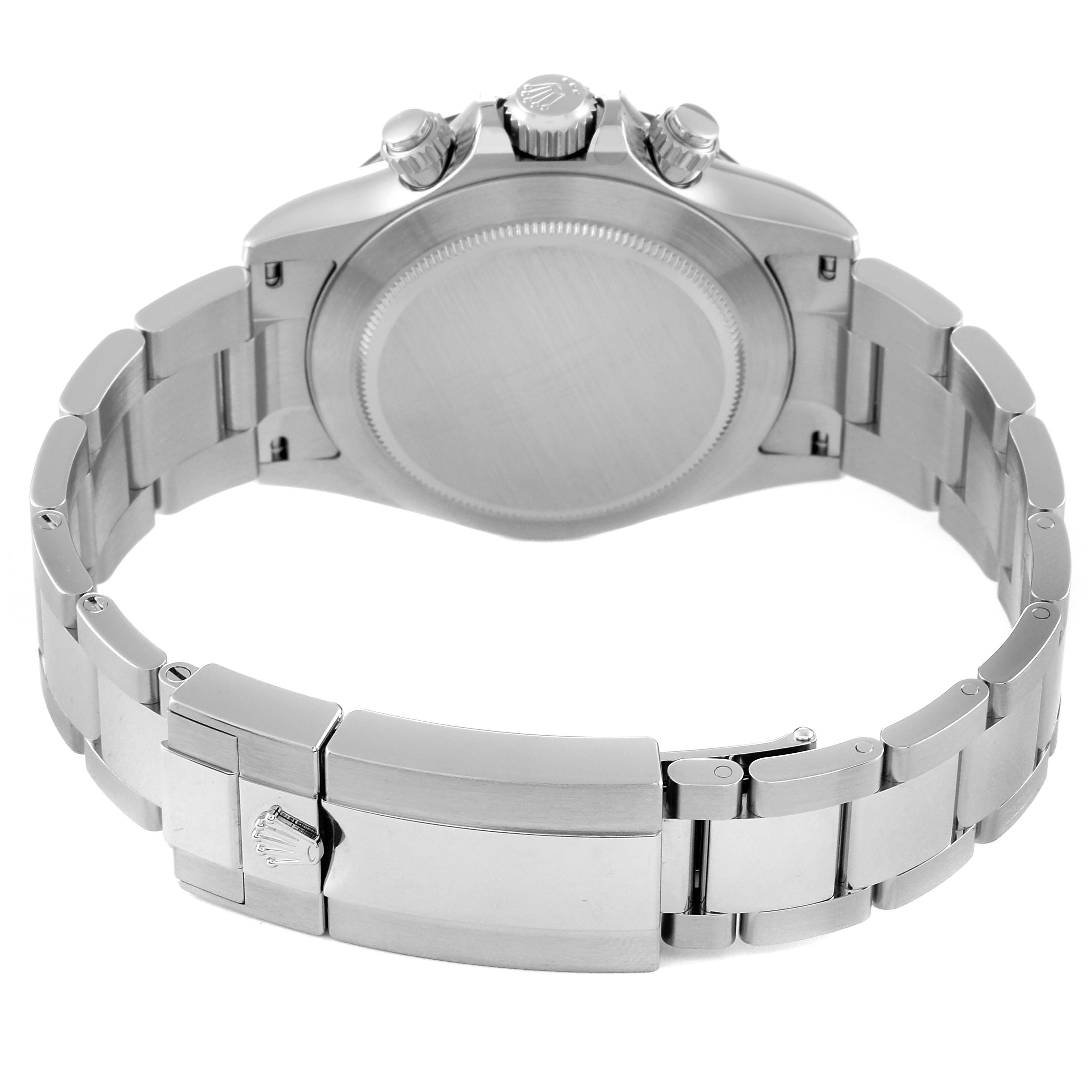 This image shows the back case, crown, push buttons, and bracelet clasp of a Rolex Daytona 116500 Men's Stainless Steel White Dial 116500 Men's Stainless Steel White Dial watch from a rear angle.