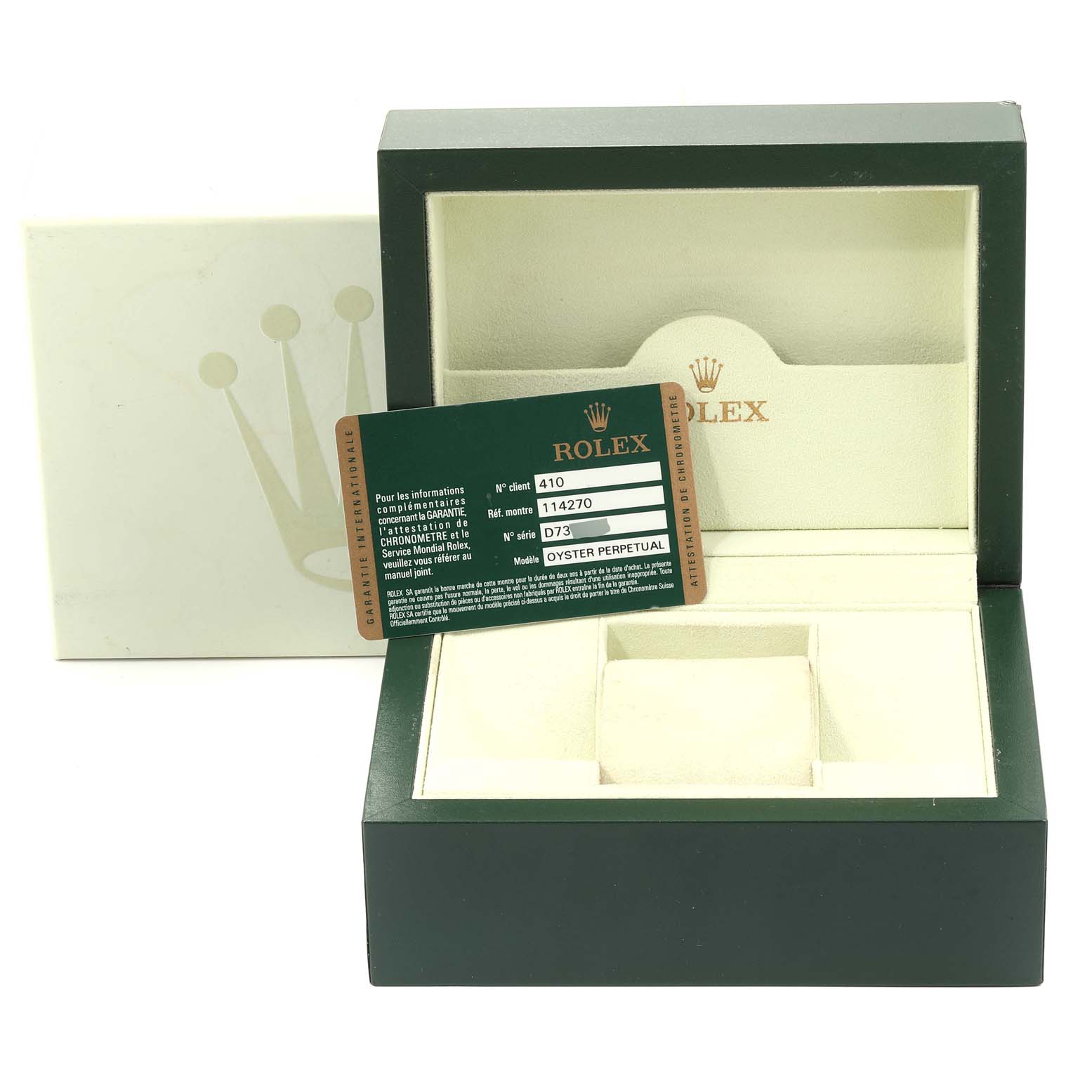 The image shows a Rolex Explorer 114270  Men
s Stainless Steel Black Dial 114270  Men
s Stainless Steel Black Dial watch box with an Oyster Perpetual model warranty card placed inside.