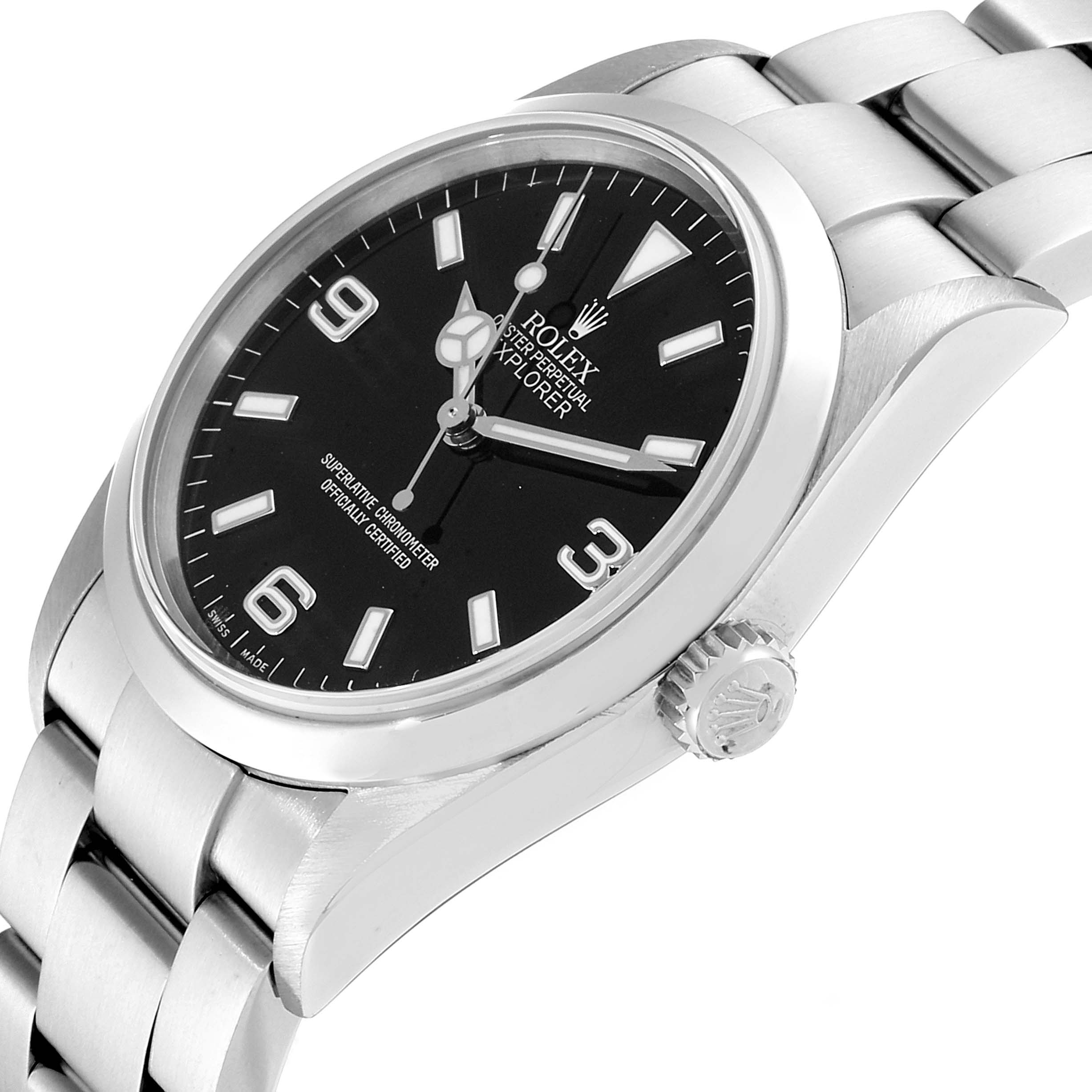 The image shows a close-up, angled view of a Rolex Explorer 114270  Men
s Stainless Steel Black Dial 114270  Men
s Stainless Steel Black Dial watch, highlighting its face, bezel, crown, and part of the bracelet.