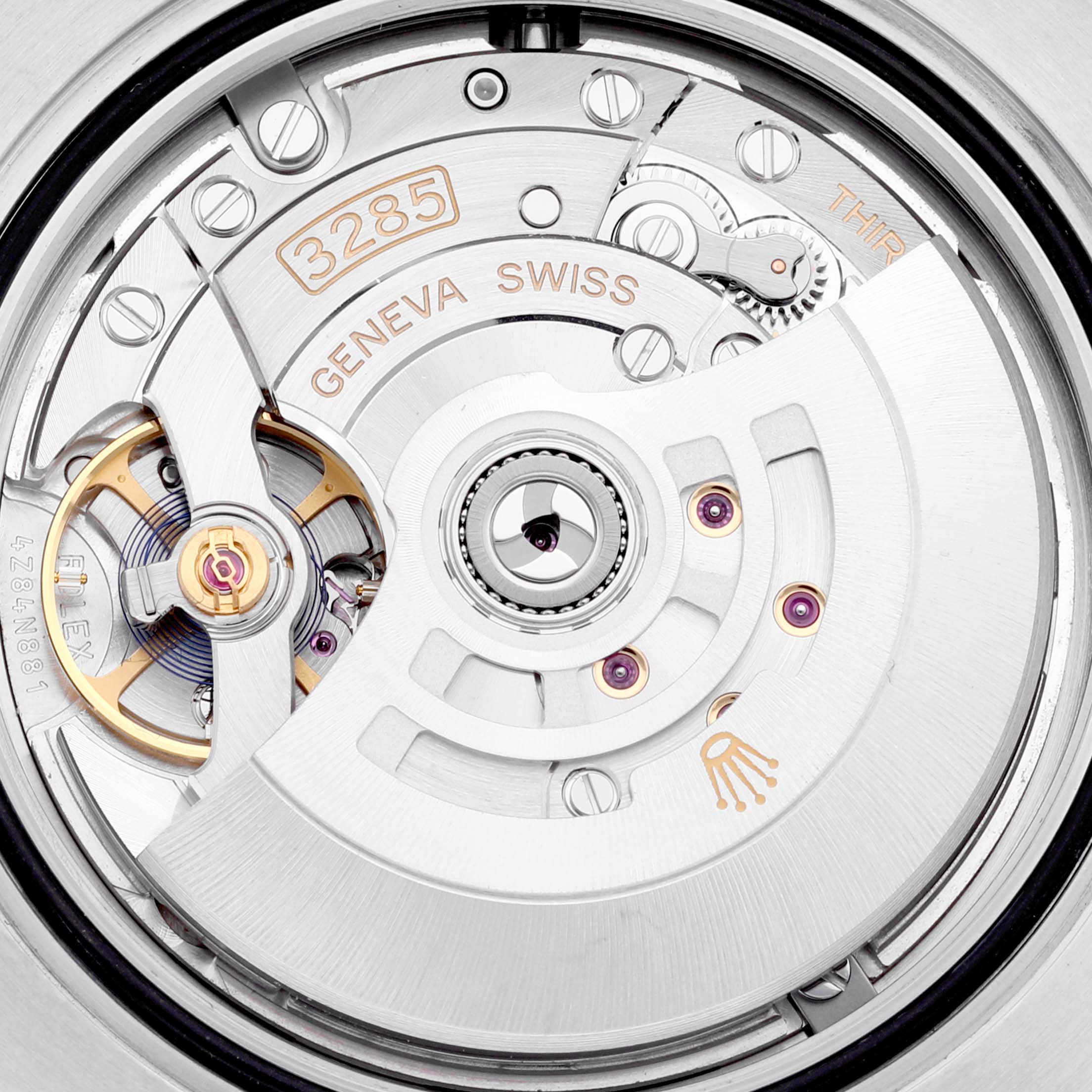 The image shows the movement of a Rolex GMT-Master 126710 Men
s Stainless Steel Black Dial 126710 Men
s Stainless Steel Black Dial watch, specifically displaying the intricate mechanisms of the caliber 3285.