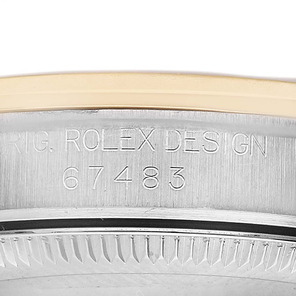 The image shows the engraved side of the case for an Oyster Perpetual Rolex, featuring the model number.