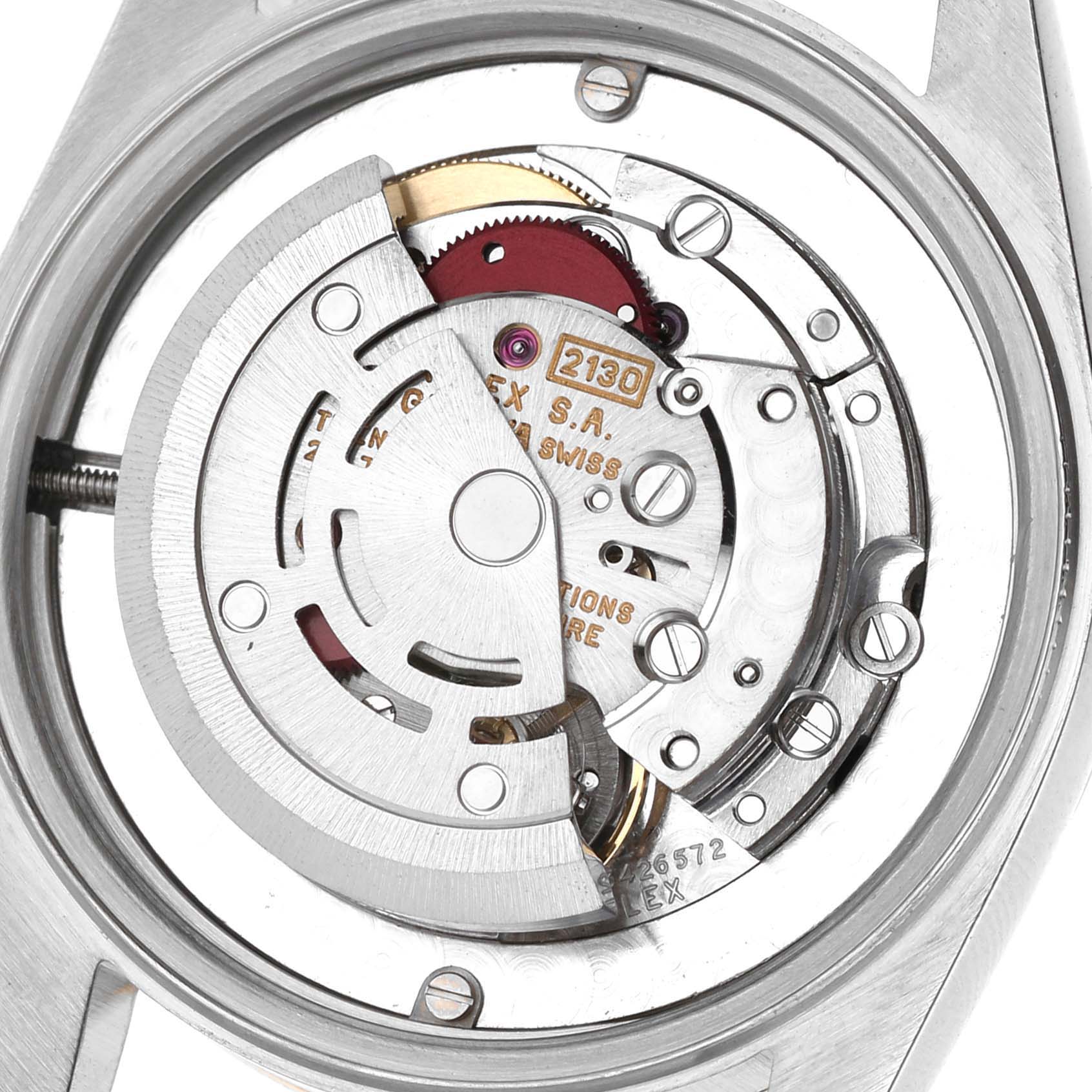 The image shows the inner mechanism of the Rolex Oyster Perpetual 67483 Women's Steel and Gold (two tone) Grey Dial watch, highlighting the movement components.