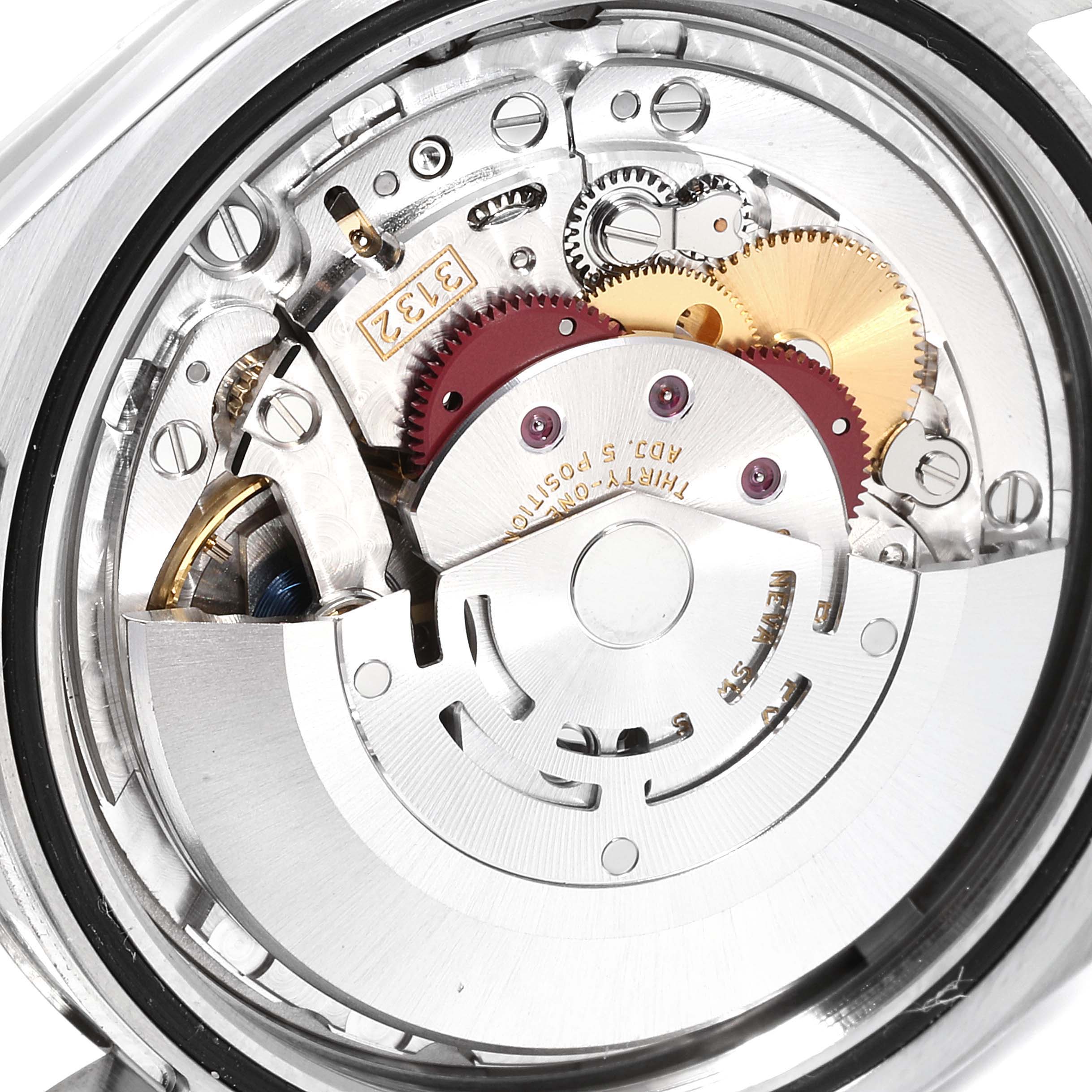 The image shows a close-up of the inner mechanical parts and movement of a Rolex Oyster Perpetual 114300  Men's Stainless Steel Silver Dial 114300  Men's Stainless Steel Silver Dial watch.