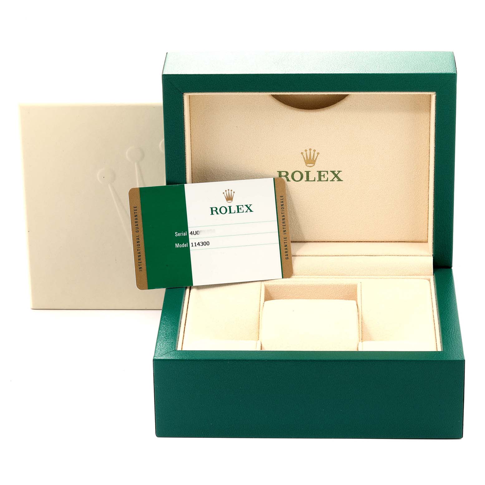The image shows an empty Rolex Oyster Perpetual 114300  Men's Stainless Steel Silver Dial 114300  Men's Stainless Steel Silver Dial watch box and an authentication card for model 114300, viewed from the front.