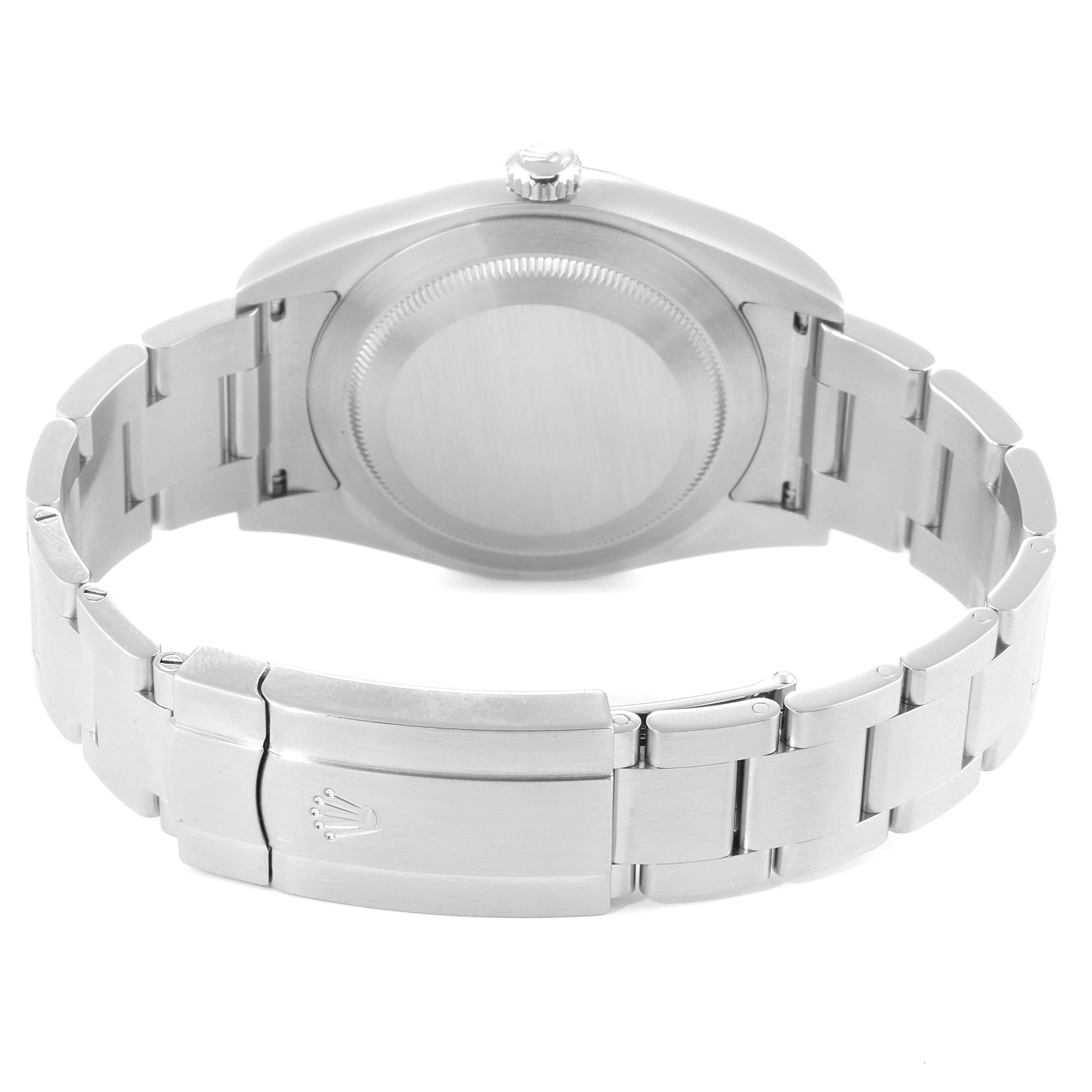 The image shows the back view of the Oyster Perpetual Rolex watch, highlighting the case back, bracelet, and clasp with the Rolex logo.