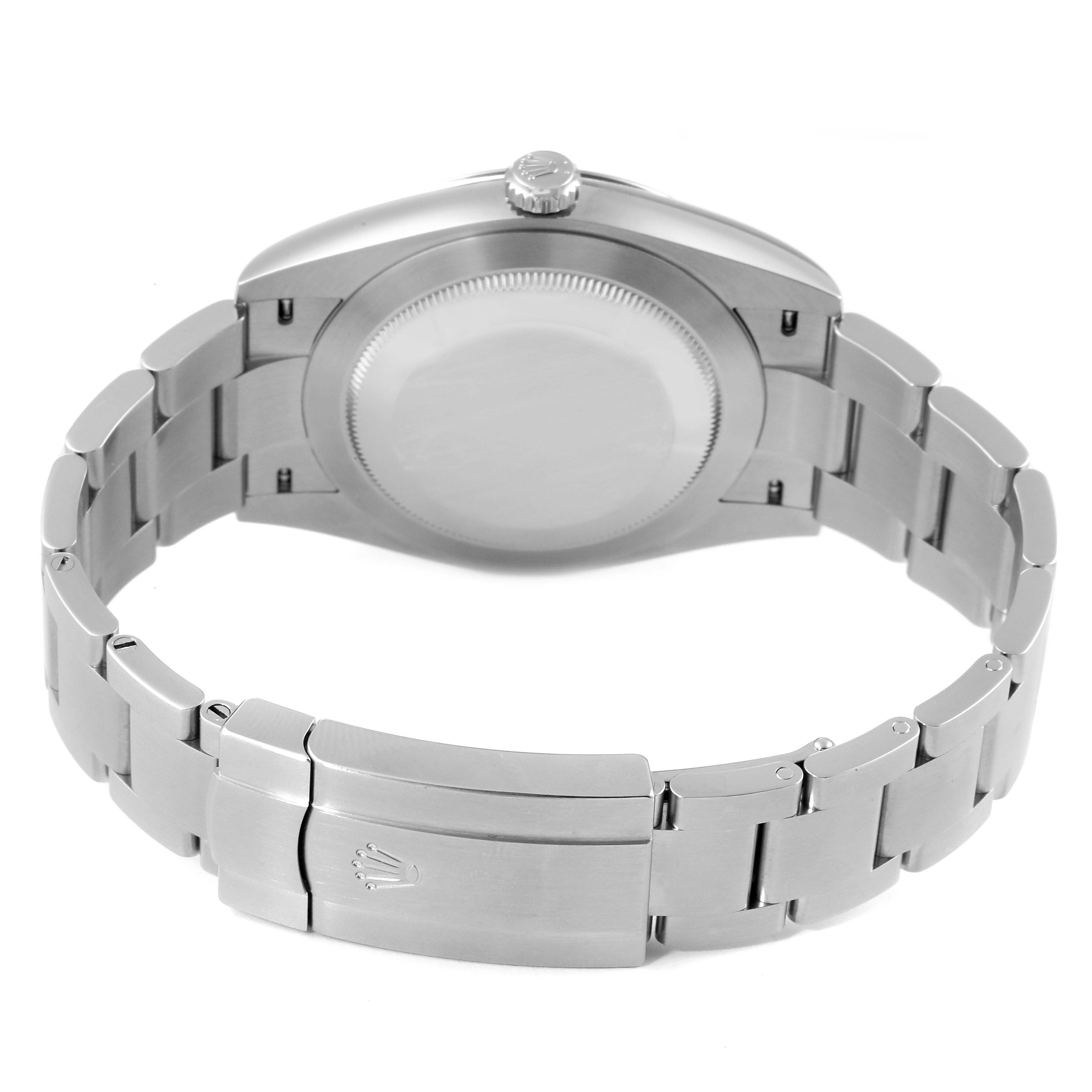 The image shows the back case and bracelet clasp of a Rolex Oyster Perpetual 124300 Men
s Stainless Steel Blue Dial 124300 Men
s Stainless Steel Blue Dial watch, viewed from the underside.