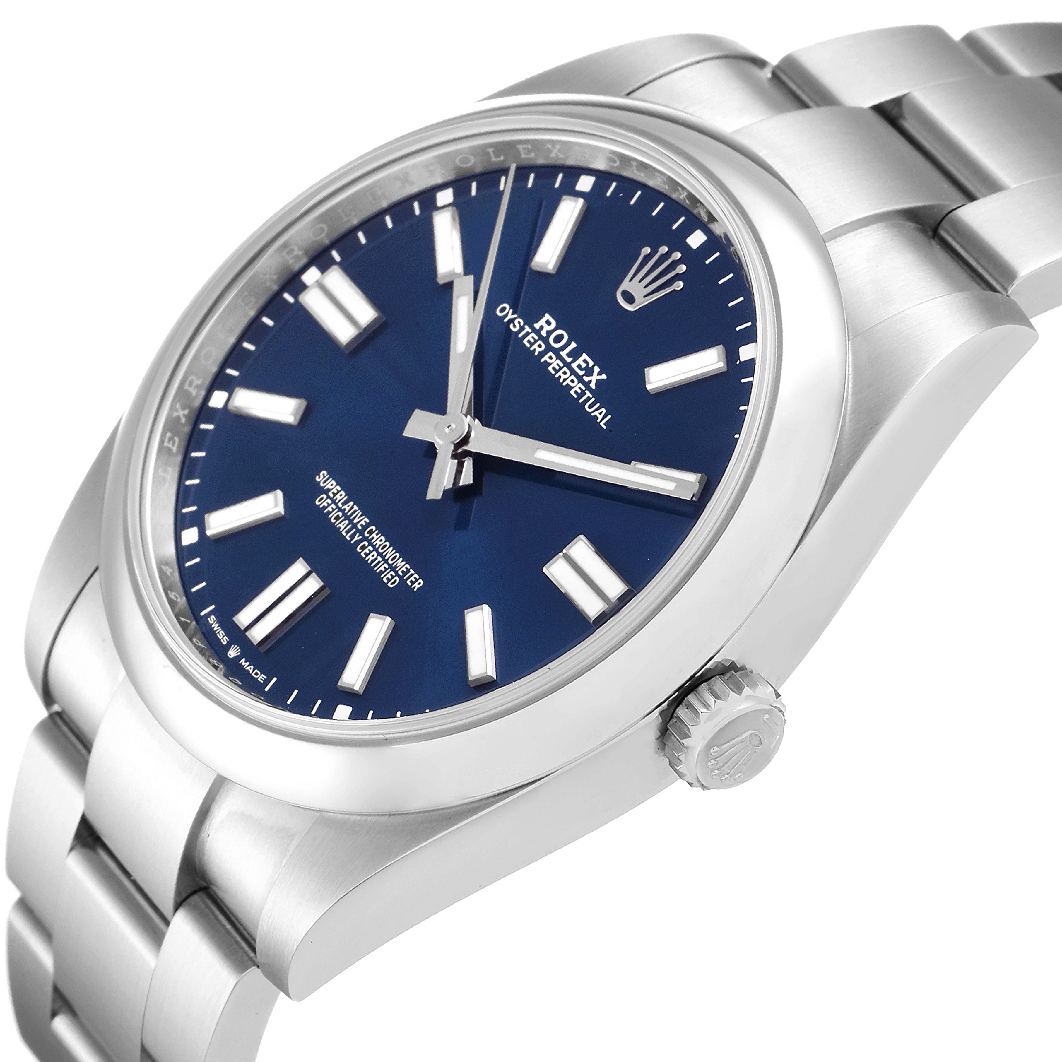 The image shows a side angle of a Rolex Oyster Perpetual 124300 Men
s Stainless Steel Blue Dial 124300 Men
s Stainless Steel Blue Dial watch focusing on the face, bezel, and bracelet.
