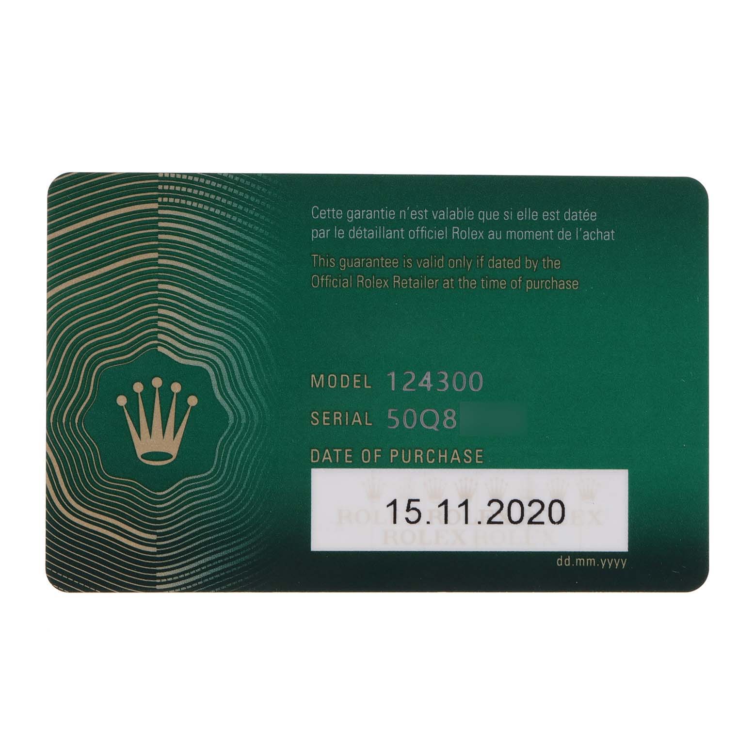 The image shows a Rolex Oyster Perpetual 124300 Men
s Stainless Steel Blue Dial 124300 Men
s Stainless Steel Blue Dial warranty card with model number 124300 and date of purchase, 15.11.2020.