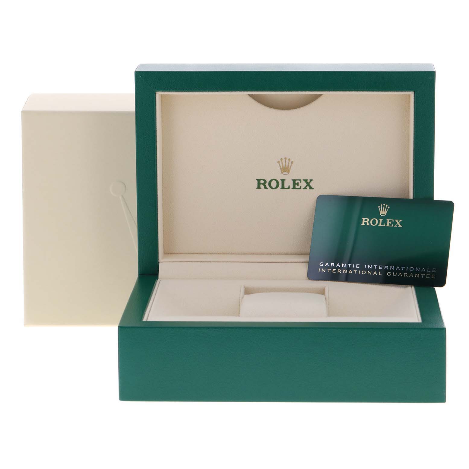 The image shows the open box of the Rolex Oyster Perpetual 124300 Men
s Stainless Steel Blue Dial 124300 Men
s Stainless Steel Blue Dial watch, along with its international guarantee card.