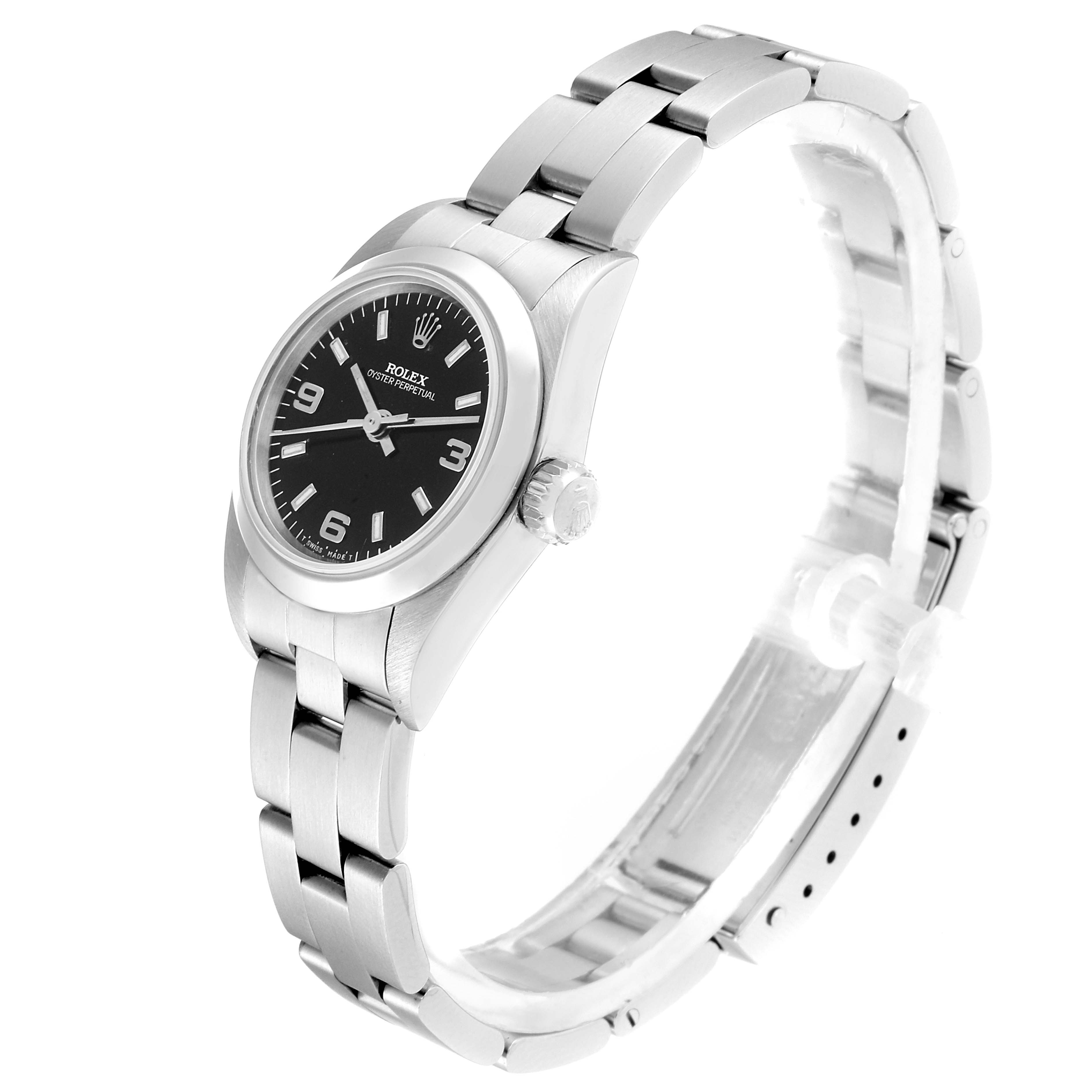 The Rolex Oyster Perpetual 67180 Women
s Stainless Steel Black Dial 67180 Women
s Stainless Steel Black Dial watch is shown at a slight angle, displaying the face, crown, and bracelet.