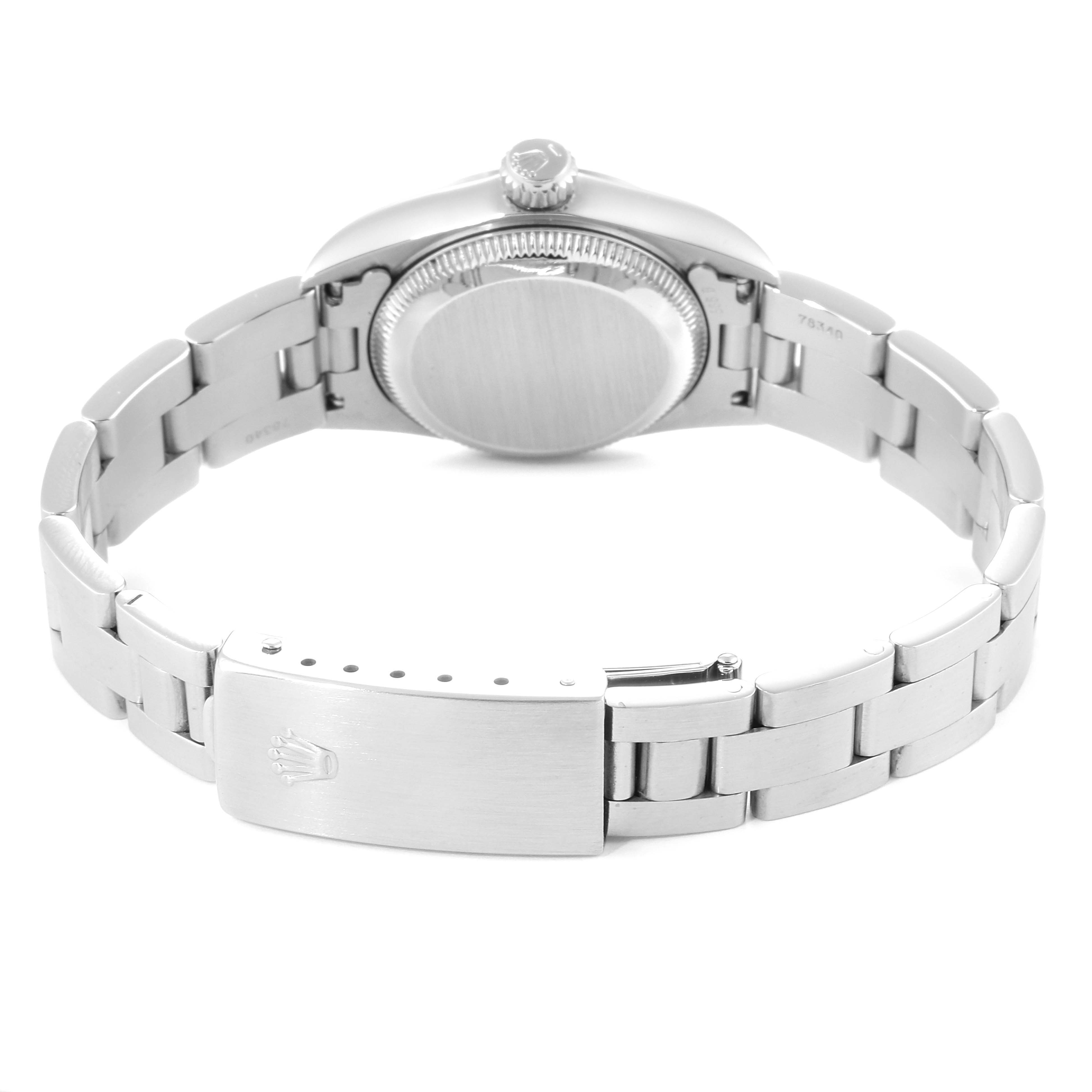 This image shows the back side of a Rolex Oyster Perpetual 67180 Women
s Stainless Steel Black Dial 67180 Women
s Stainless Steel Black Dial watch, highlighting the closed clasp and bracelet links.