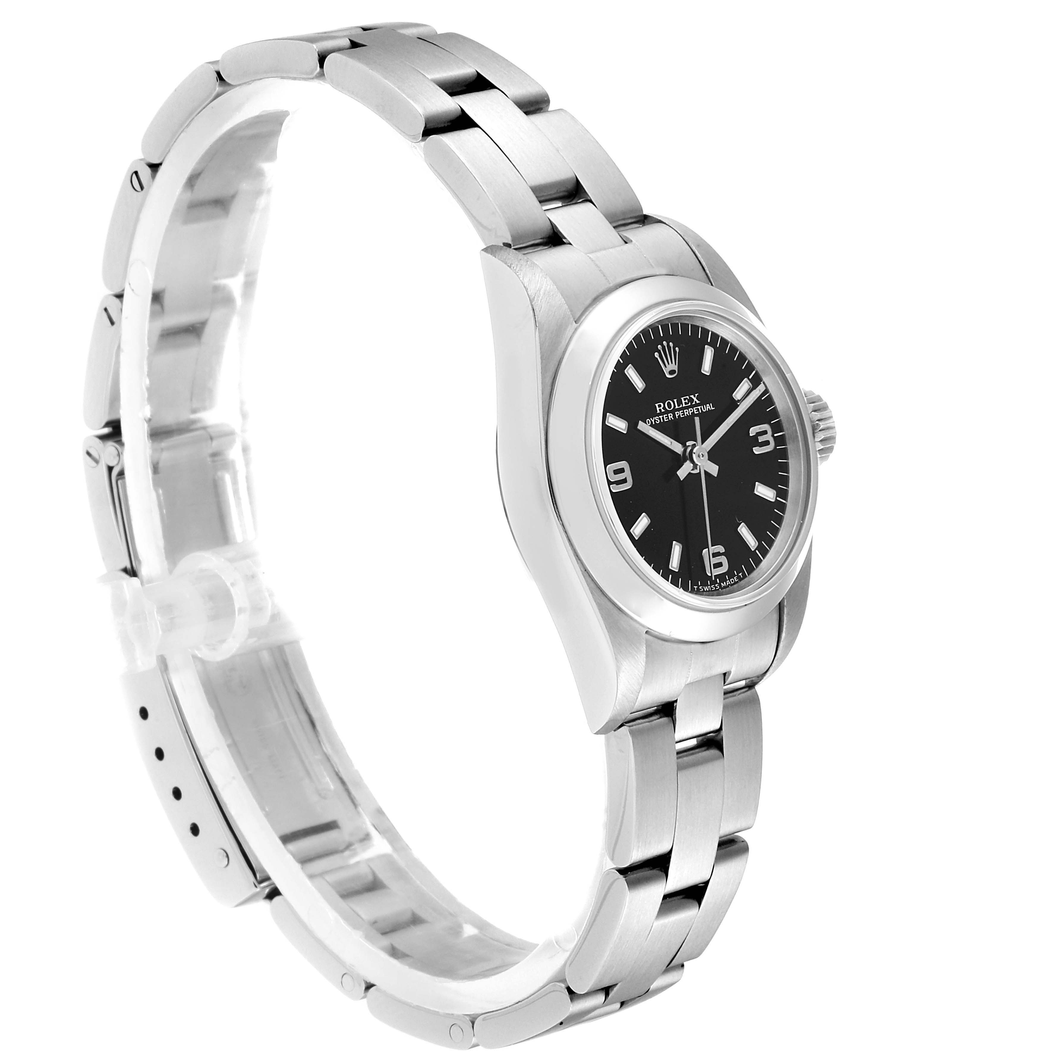 The image shows a side angle view of the Rolex Oyster Perpetual 67180 Women
s Stainless Steel Black Dial 67180 Women
s Stainless Steel Black Dial watch, highlighting its bracelet, case, and black dial.