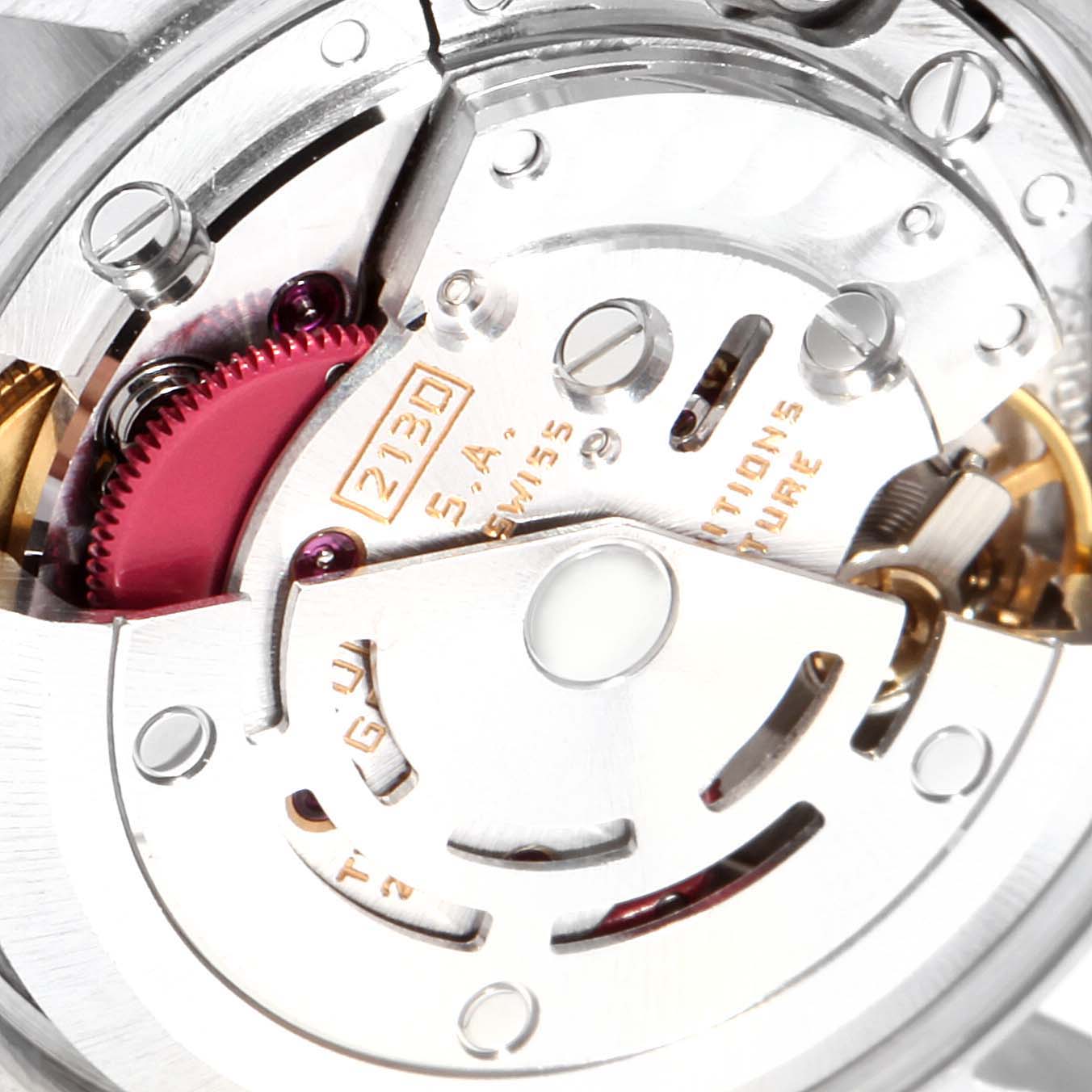 This image shows a close-up of the movement and internal mechanism of a Rolex Oyster Perpetual 67180 Women
s Stainless Steel Black Dial 67180 Women
s Stainless Steel Black Dial watch.