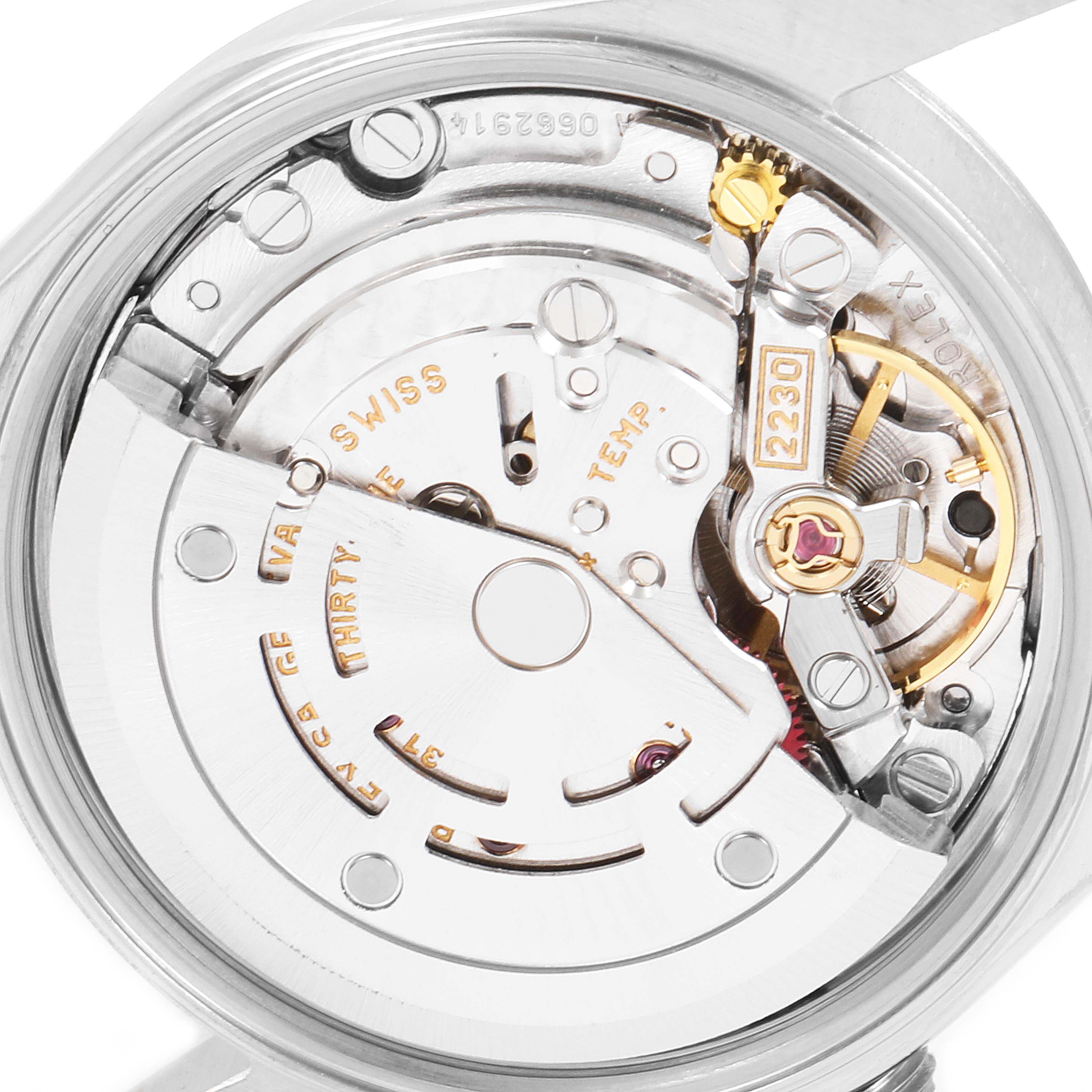 The image shows a close-up of the inner mechanical movement of a Rolex Oyster Perpetual 76094 Women's Stainless Steel Black Dial 76094 Women's Stainless Steel Black Dial watch.