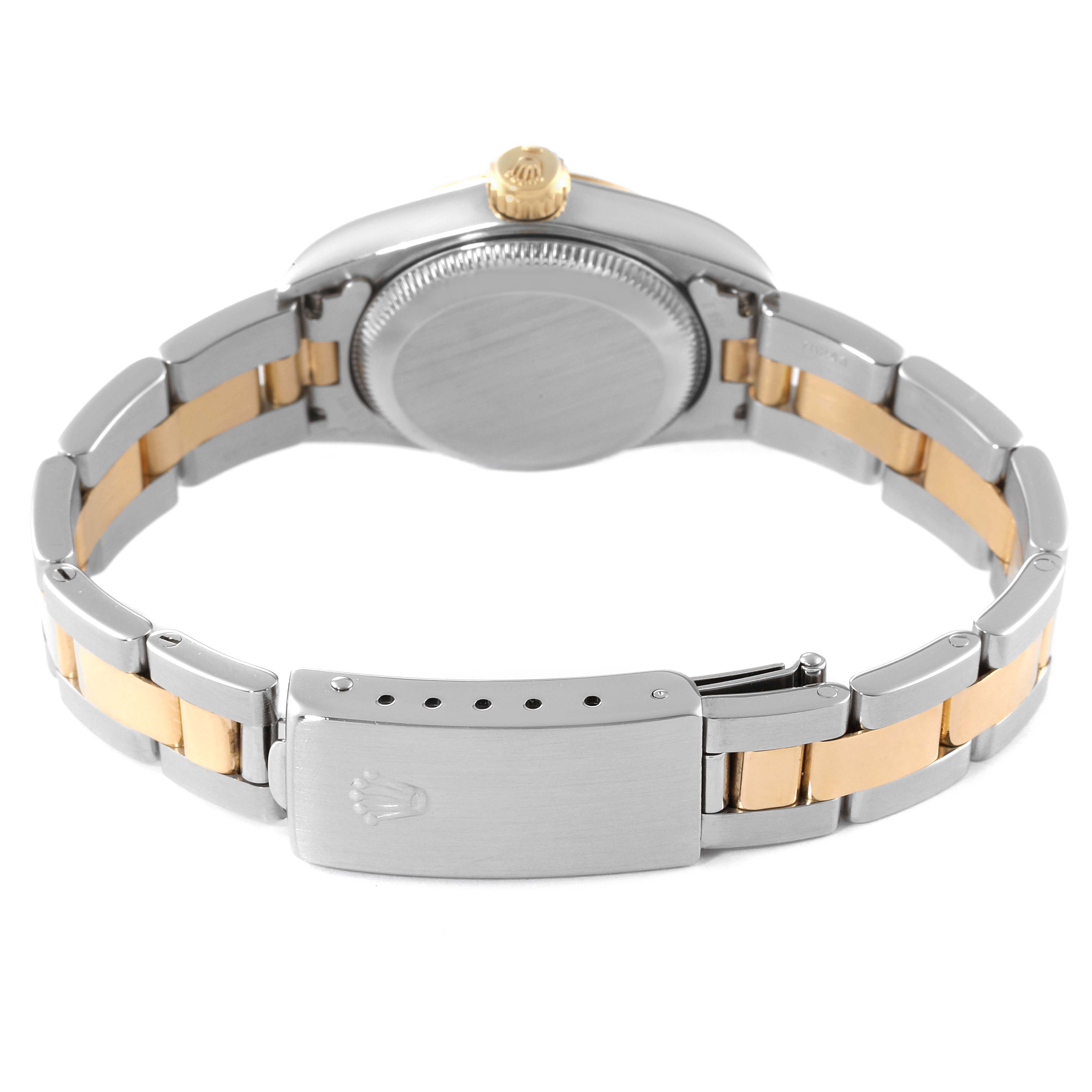 The image shows the back view of a Rolex Oyster Perpetual 76193 Women's Steel and Gold (two tone) White Dial 76193 Women's Steel and Gold (two tone) White Dial watch, highlighting the case, crown, and two-tone bracelet with clasp.