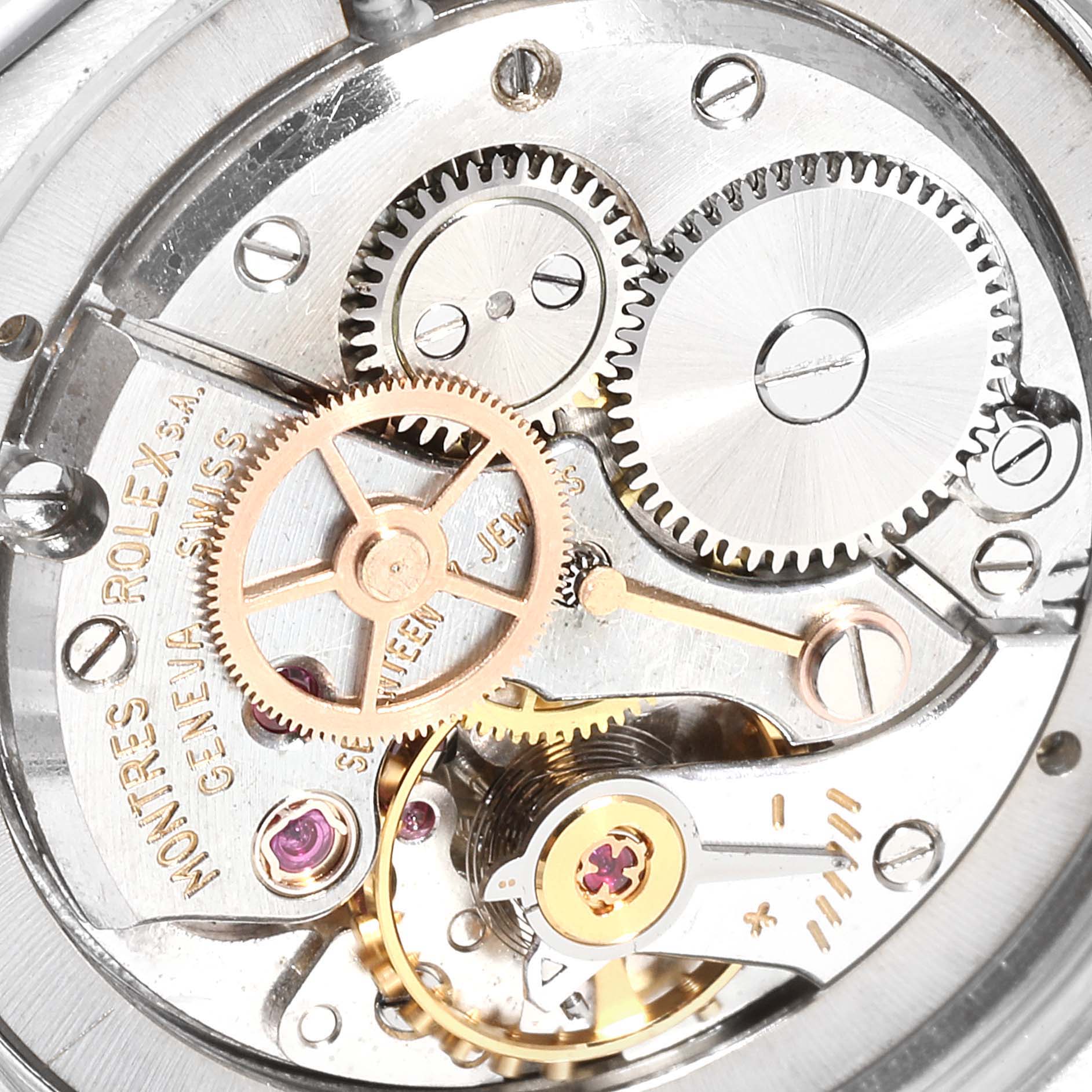 Close-up view of the internal mechanism of a Rolex Vintage Collection 6694 Men
s Stainless Steel Black Dial 6694 Men
s Stainless Steel Black Dial model, showcasing gears and intricate components.