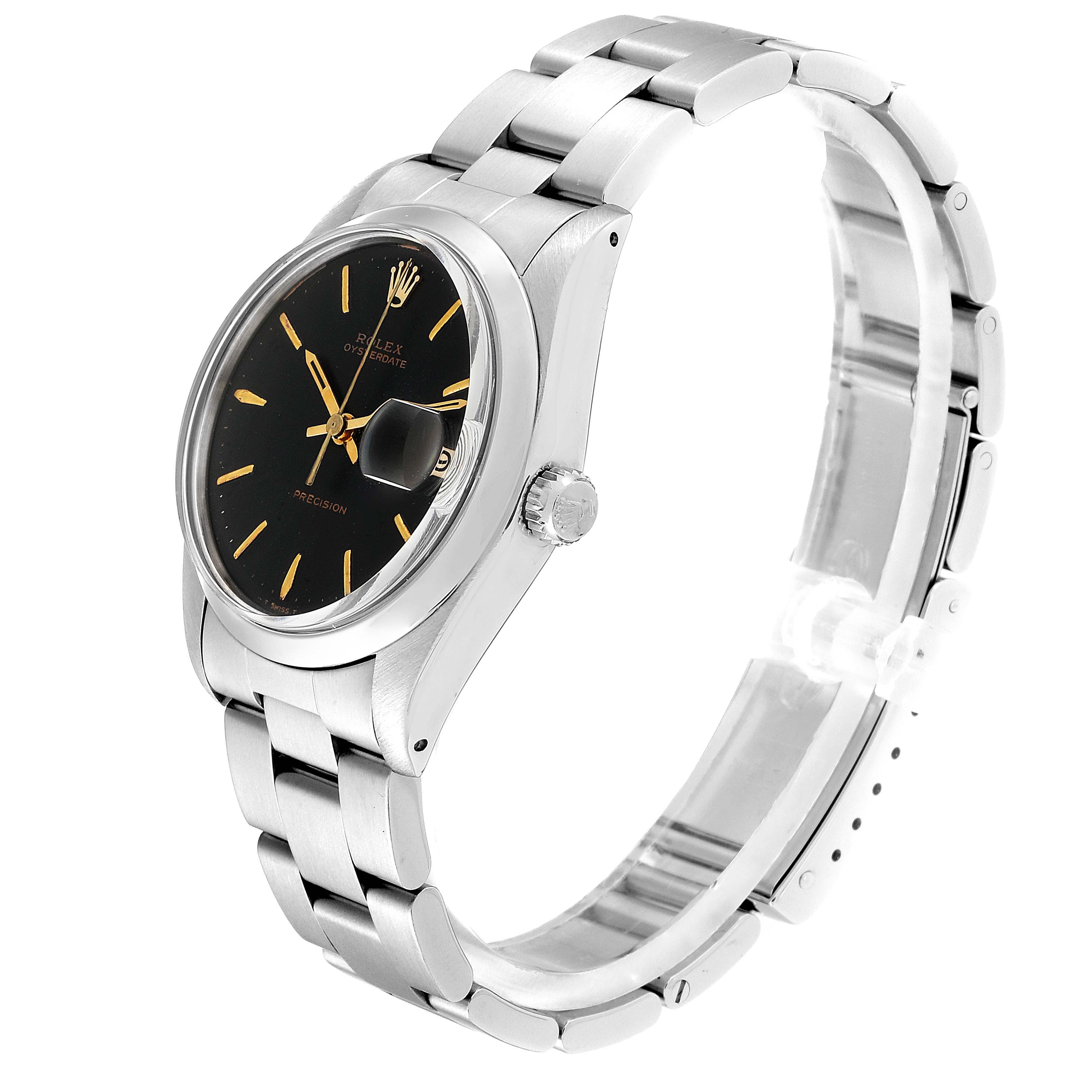 The image shows a side angle of a Rolex Vintage Collection 6694 Men
s Stainless Steel Black Dial 6694 Men
s Stainless Steel Black Dial watch, highlighting its black dial, gold markers, and stainless steel band.