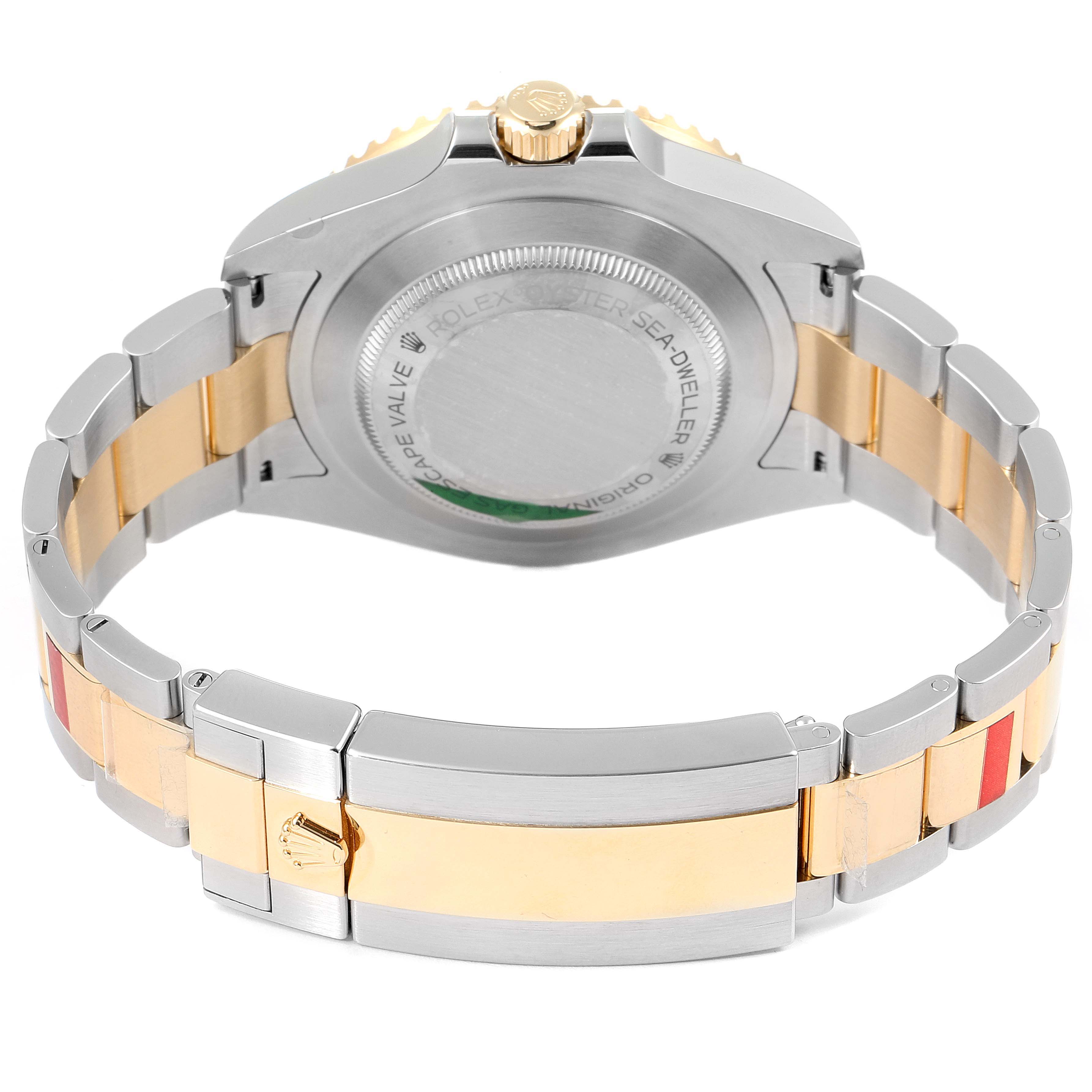This image shows the back view of the Rolex Sea-Dweller 126603 Men's Steel and Gold (two tone) Black Dial 126603 Men's Steel and Gold (two tone) Black Dial watch, highlighting the case back and two-tone bracelet.