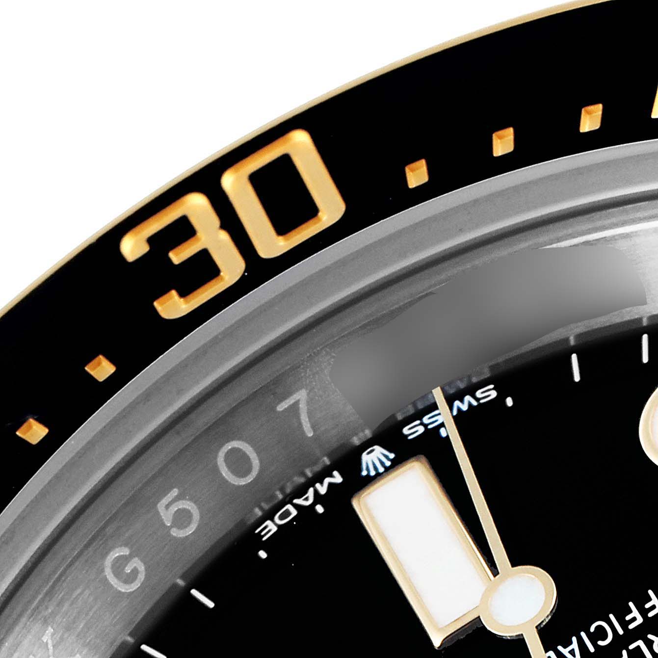 The image shows a close-up angle of the bezel and part of the dial of the Rolex Sea-Dweller 126603 Men's Steel and Gold (two tone) Black Dial 126603 Men's Steel and Gold (two tone) Black Dial watch.