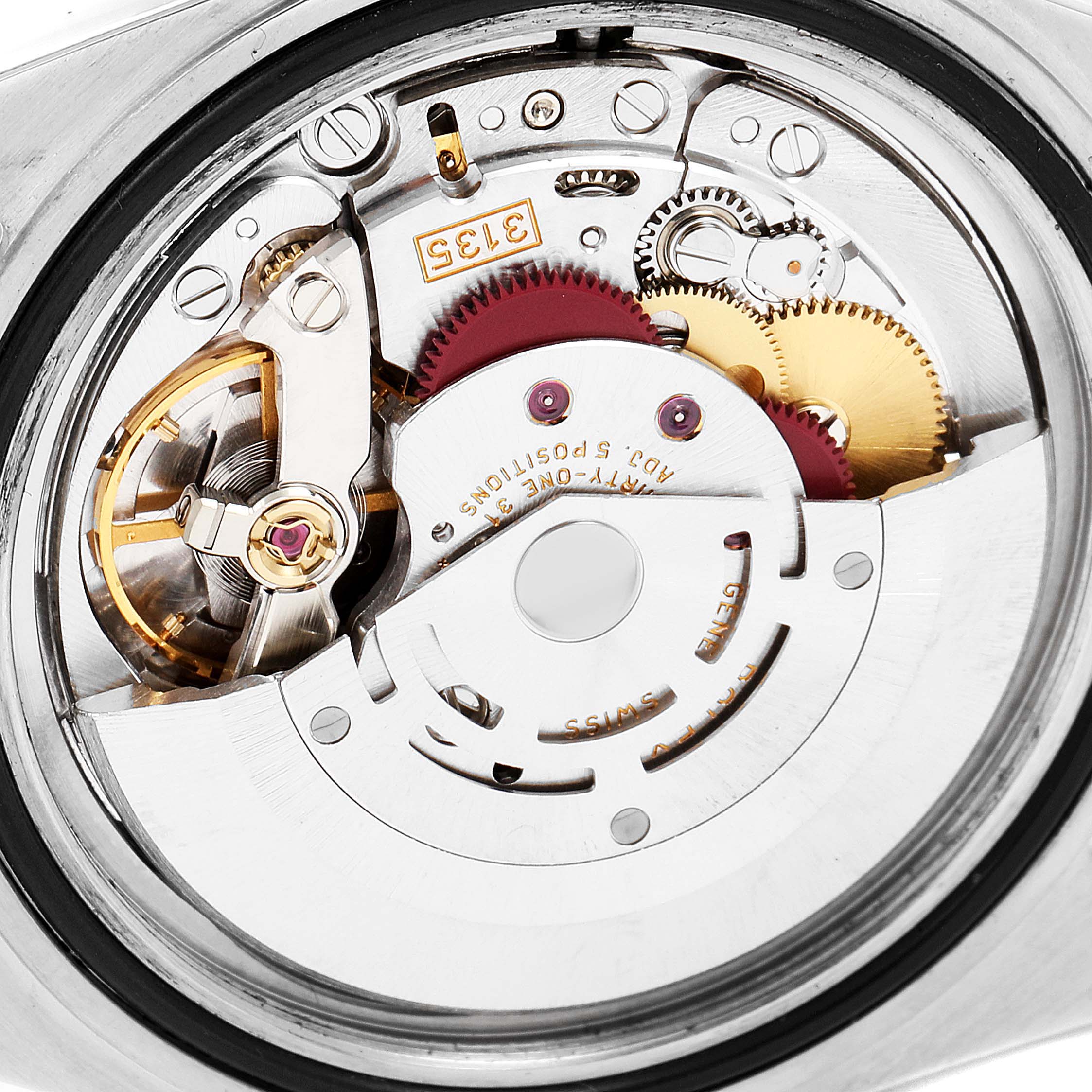 This image shows the movement and internal mechanisms of a Rolex Submariner 16613 Men's Steel and Gold (two tone) Black Dial 16613 Men's Steel and Gold (two tone) Black Dial watch from a close-up, top-down angle.