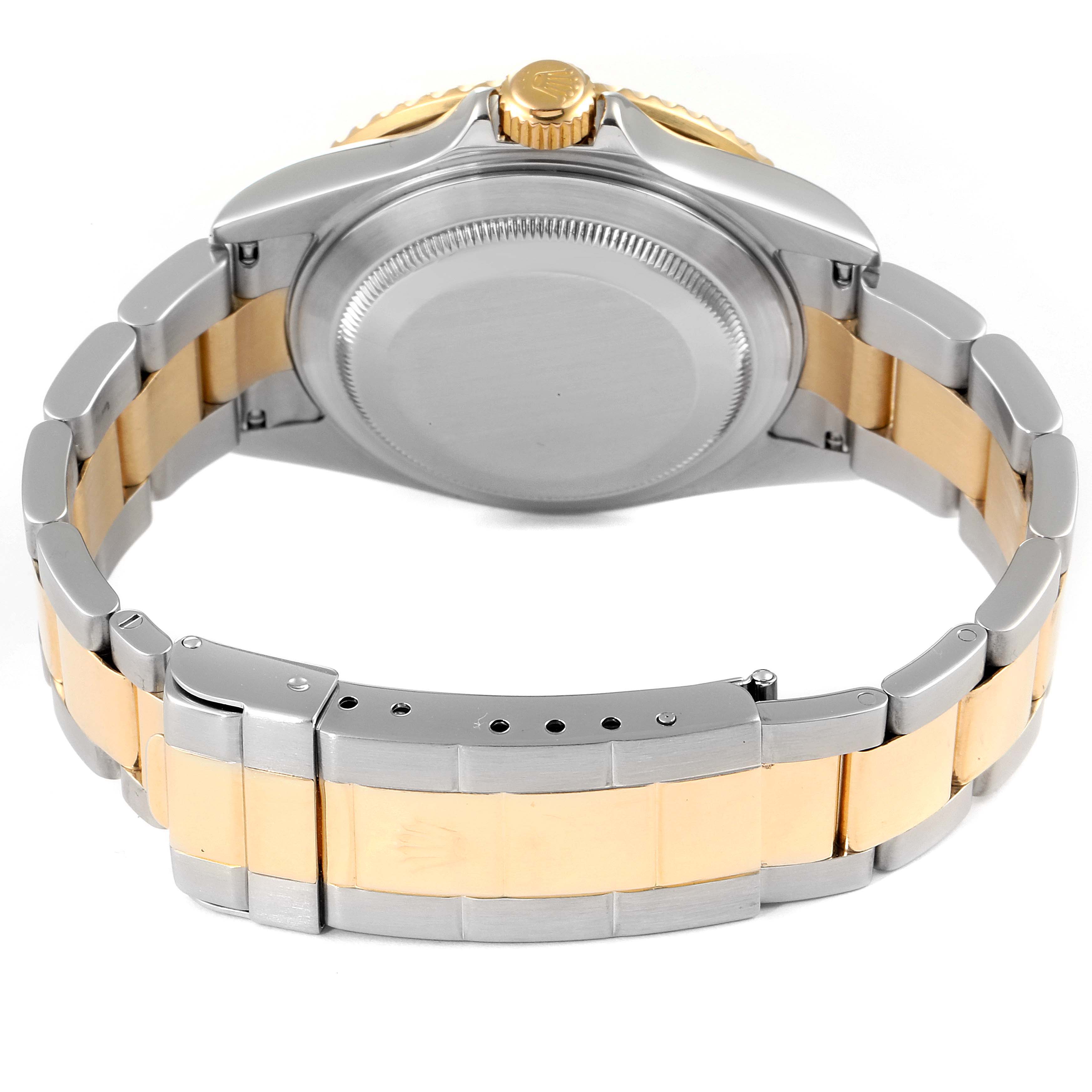 The image shows the back of a Rolex Submariner 16613 Men's Steel and Gold (two tone) Black Dial 16613 Men's Steel and Gold (two tone) Black Dial watch, including the clasp, bracelet, and case back.