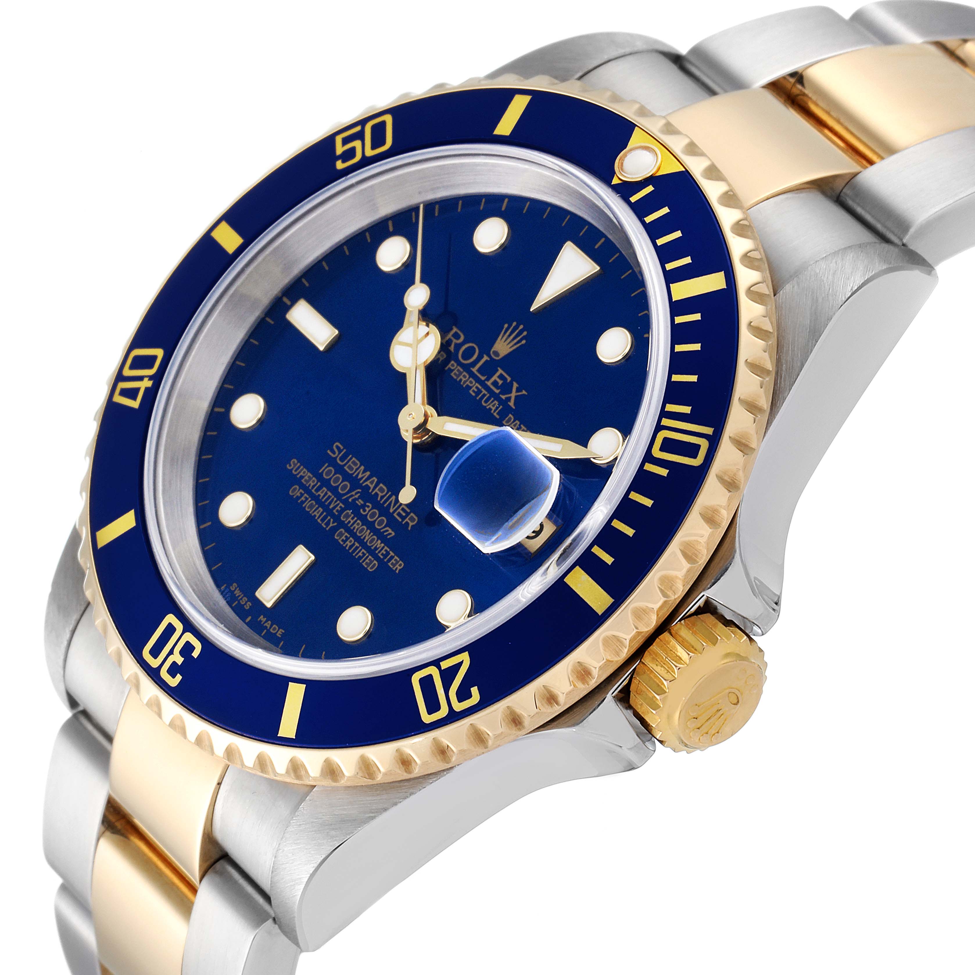 This image shows a Rolex Submariner 16613 Men
s Steel and Gold (two tone) Blue Dial 16613 Men
s Steel and Gold (two tone) Blue Dial watch from an angled side view, highlighting its blue dial, bezel, and two-tone bracelet.