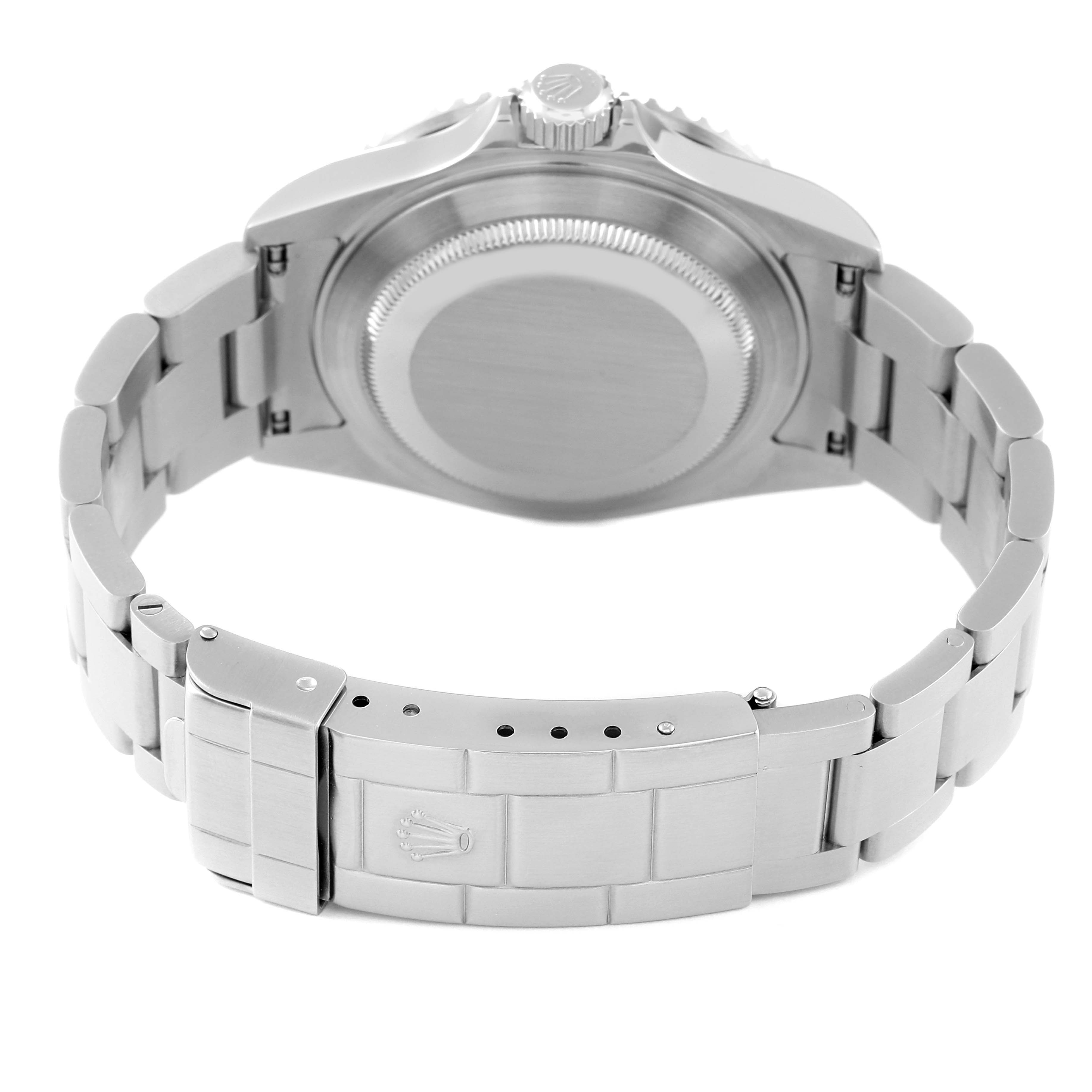 This image shows the backside of a Rolex Submariner 16610LV Men's Stainless Steel Black Dial 16610LV Men's Stainless Steel Black Dial watch, displaying the case back and the clasp of the bracelet.