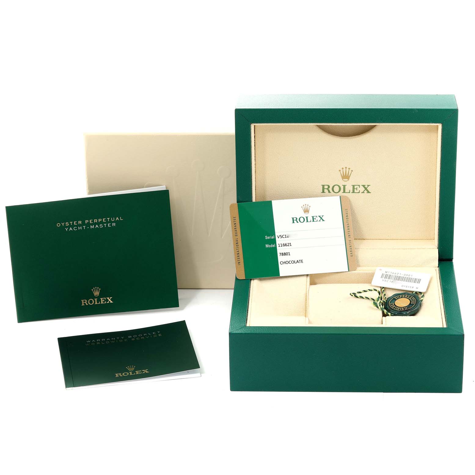 The image shows an open Rolex Yacht-Master 116621 Men's Steel and Gold (two tone) Brown Dial 116621 Men's Steel and Gold (two tone) Brown Dial watch box including manuals, a warranty booklet, and a tag.