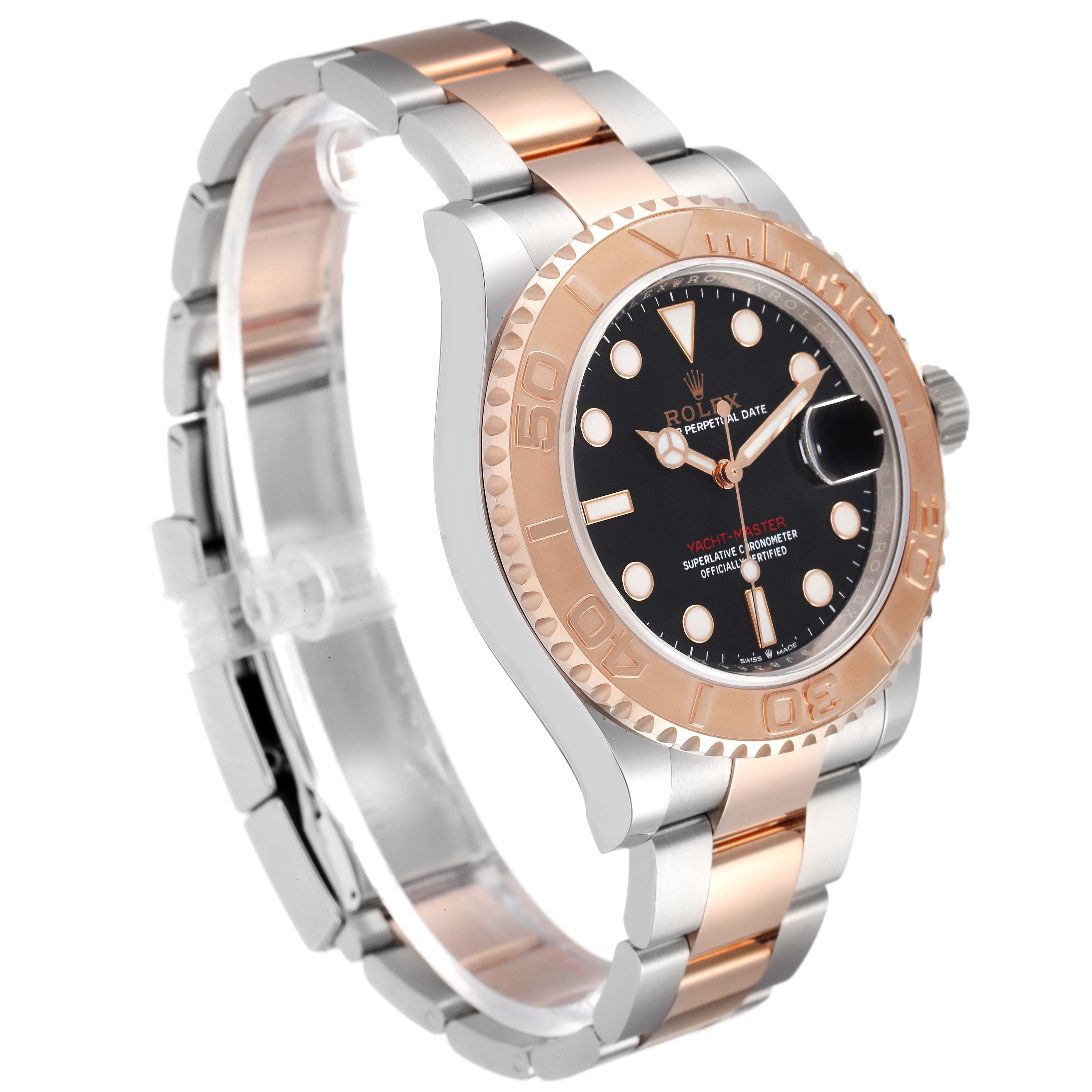 The Yacht-Master Rolex watch is shown at a three-quarter angle, highlighting its bezel, dial, and metal bracelet.