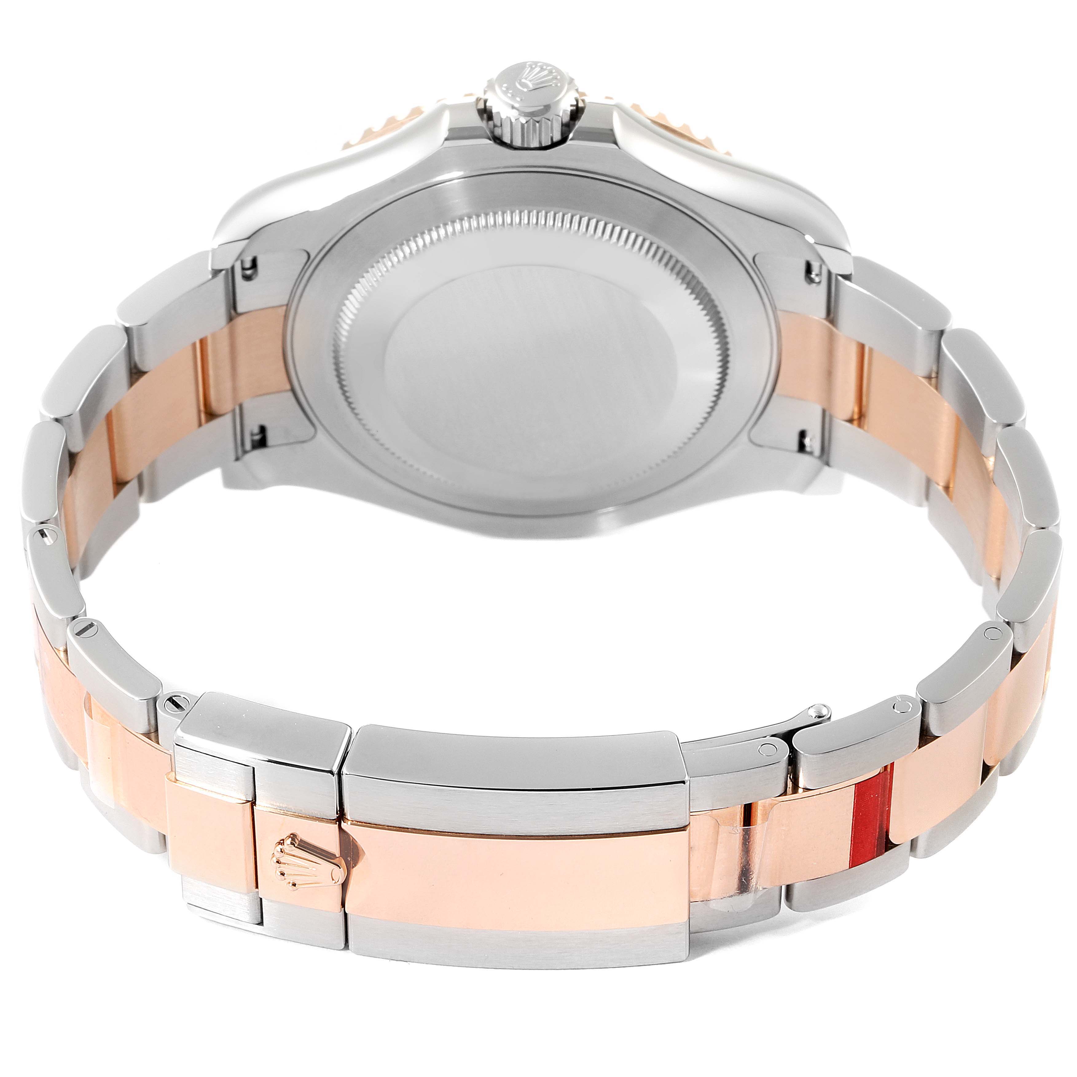 The image shows the back case and clasp of a Rolex Yacht-Master 126621 Men
s Steel and Gold (two tone) Black Dial 126621 Men
s Steel and Gold (two tone) Black Dial watch, highlighting its two-tone metal bracelet.