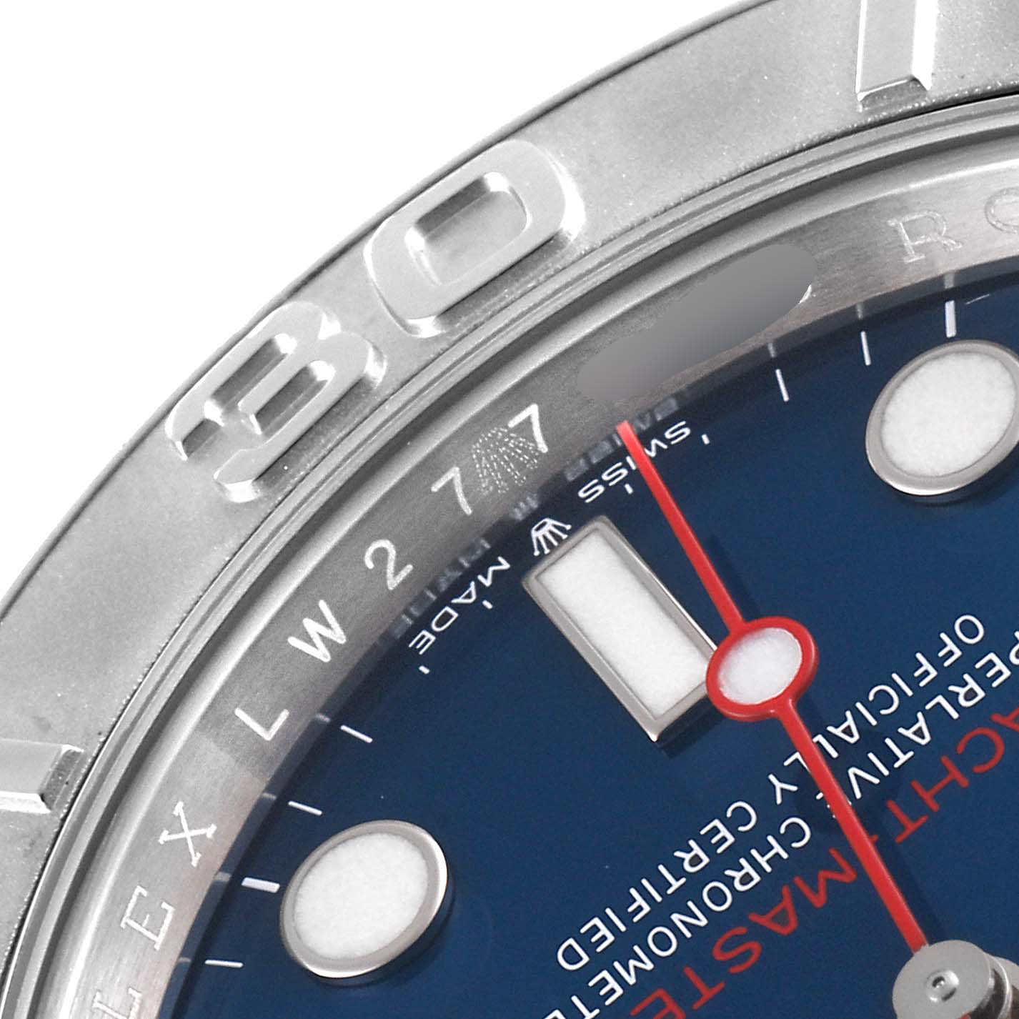 This close-up angle of the Rolex Yacht-Master 126622 Men's Stainless Steel Blue Dial 126622 Men's Stainless Steel Blue Dial watch shows parts of the bezel, dial, and markers.