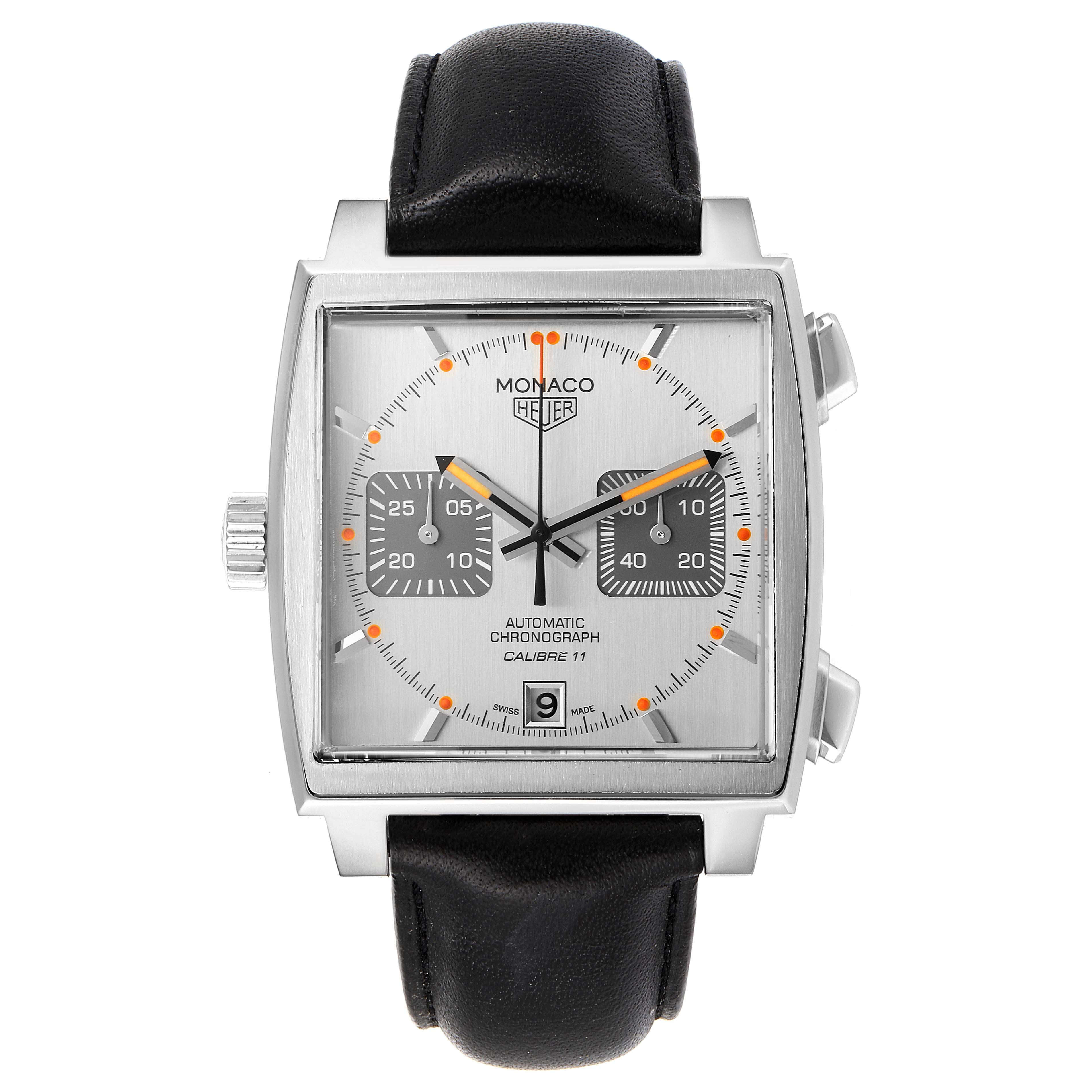The image shows a front-facing view of the Tag Heuer Monaco model watch, highlighting its square dial and black leather strap.