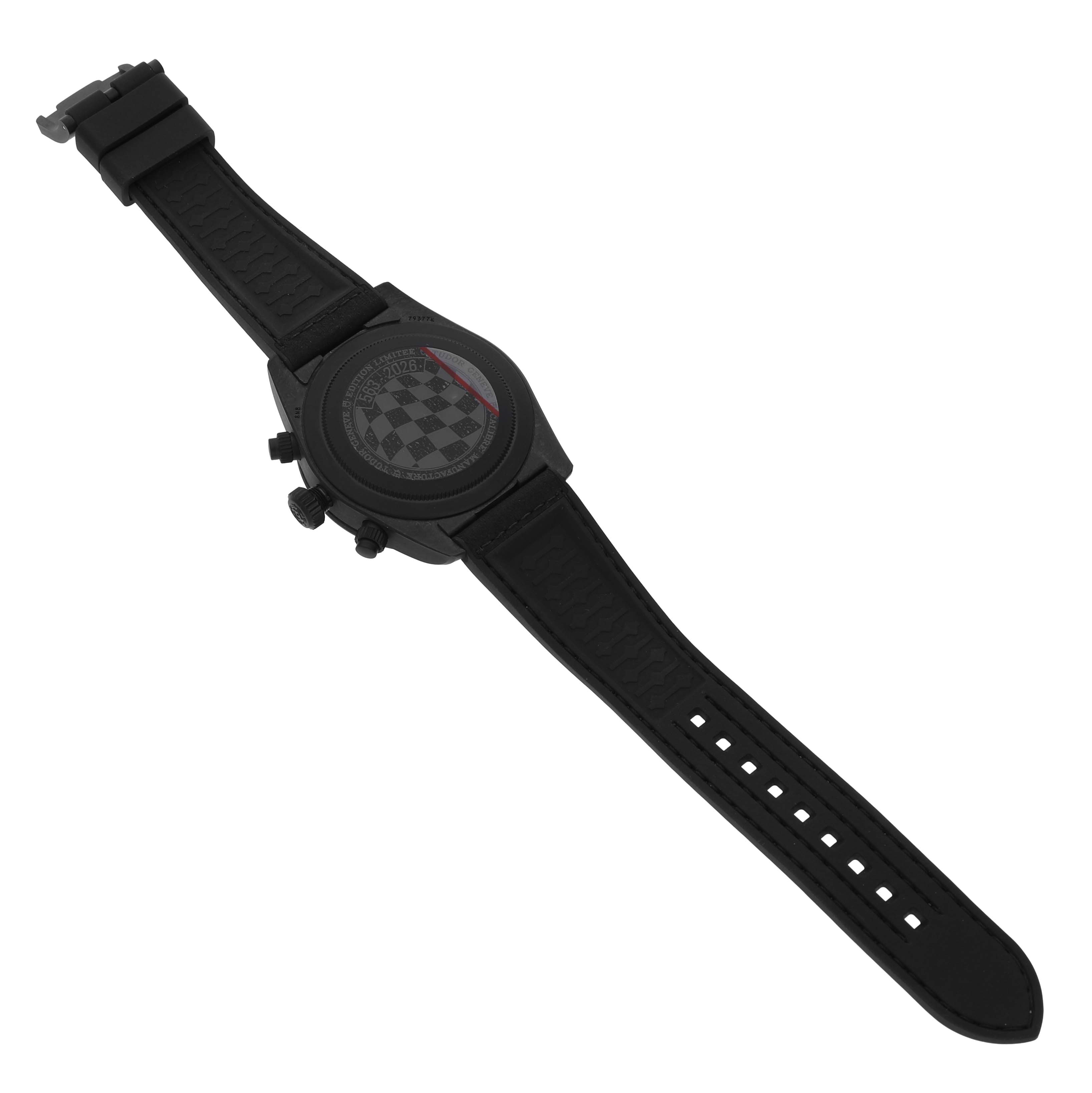 The Tudor Heritage Black Bay 79377KN Men's Titanium White Dial watch is shown from the back, highlighting the case back, strap, and buckle.