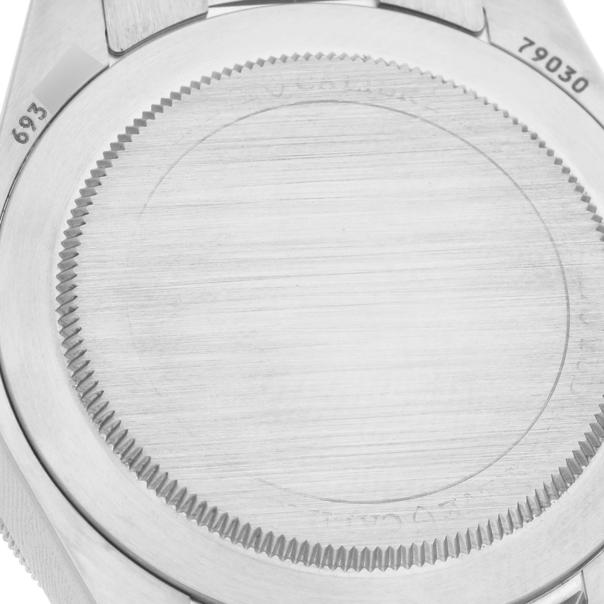 The image shows the back case of a Tudor Heritage Black Bay 79030N Men's Stainless Steel Black Dial 79030N Men's Stainless Steel Black Dial watch, focusing on the brushed metal finish and engraved details.