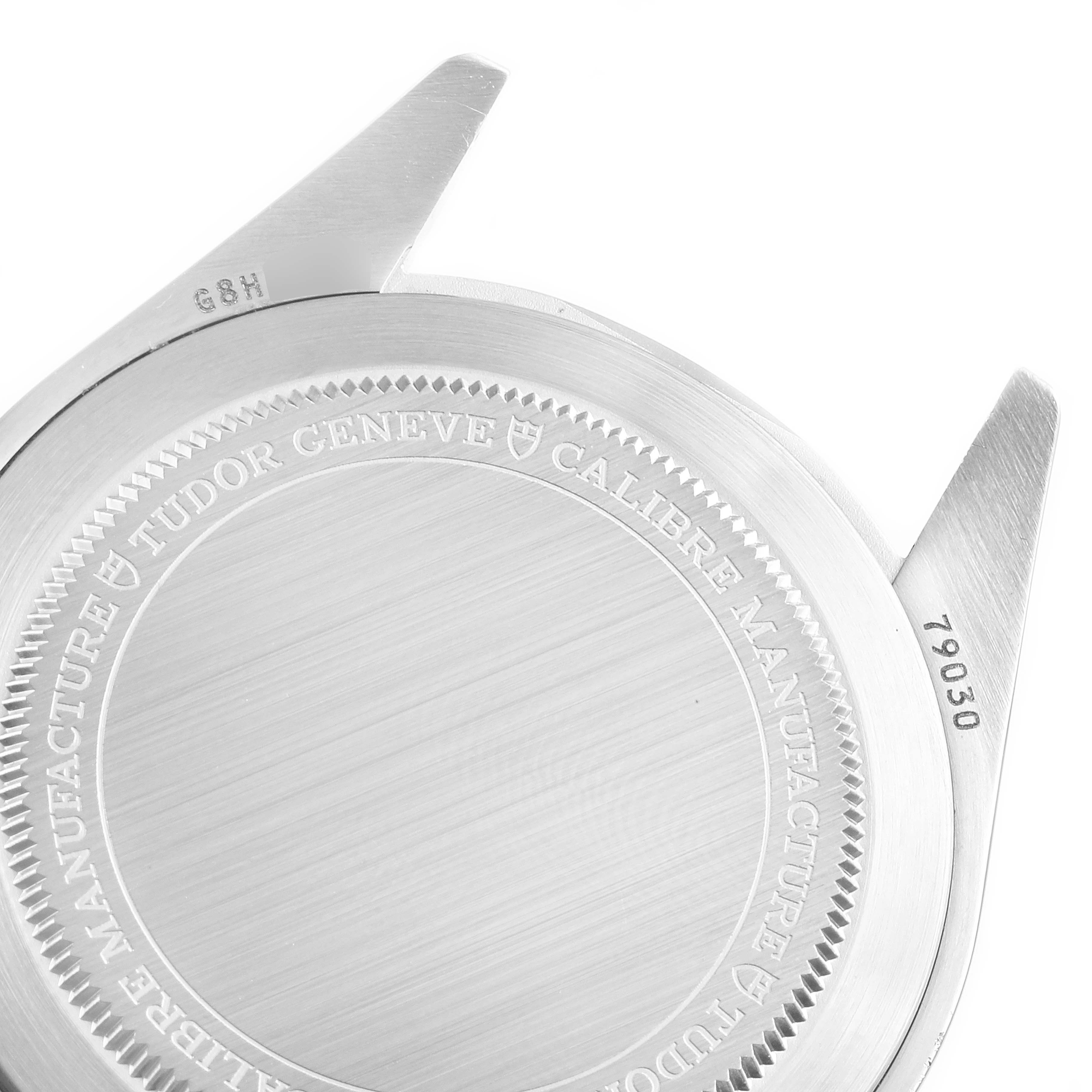 The image shows the engraved back case and lugs of a Tudor Heritage Black Bay 79030N Men's Stainless Steel Black Dial 79030N Men's Stainless Steel Black Dial watch.