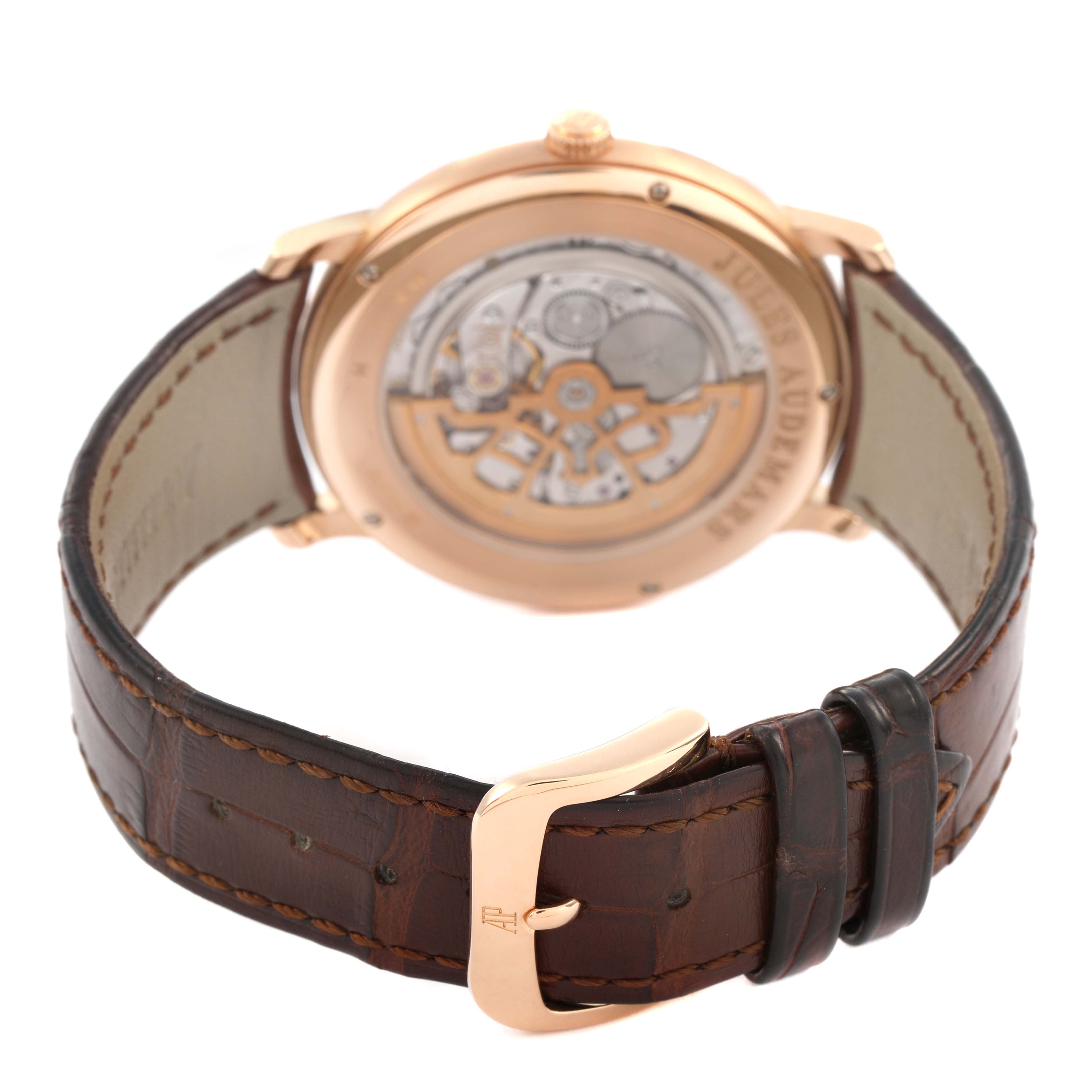 The image shows the back view of a Jules model by Audemars Piguet, highlighting the exhibition case back and leather strap with buckle.