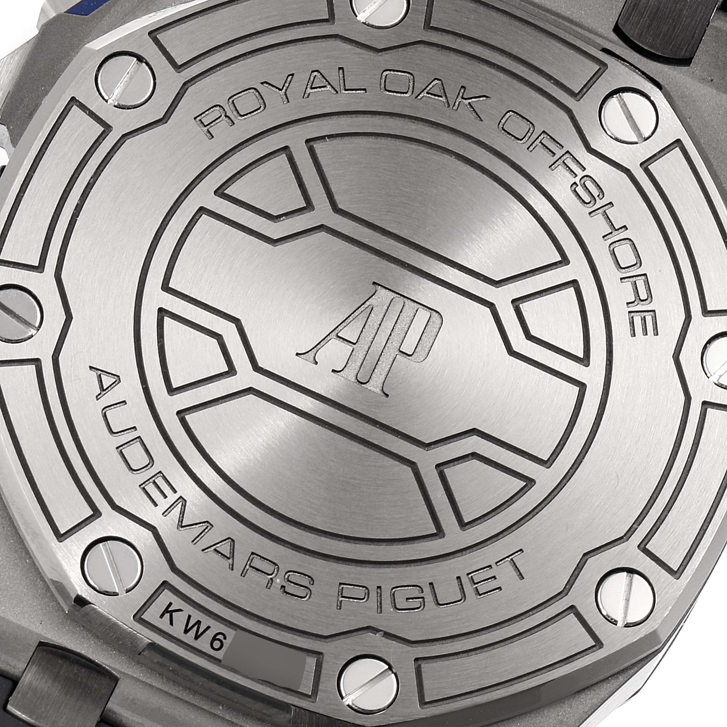 This image shows the back case of the Audemars Piguet Royal Oak Offshore 26480TI.OO.A027CA.01 Men's Titanium Blue Dial 26480TI.OO.A027CA.01 Men's Titanium Blue Dial watch, engraved with the brand and model name.