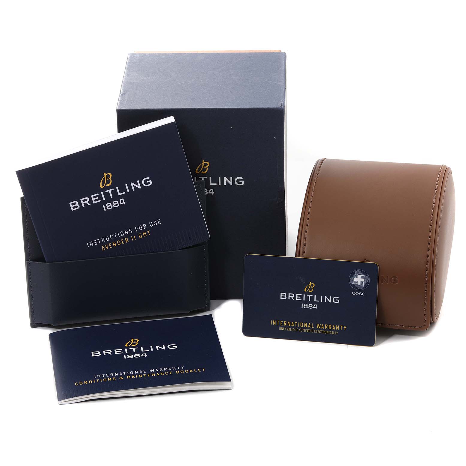 This image shows the packaging and accessories for a Breitling Avenger A32390 Men's Stainless Steel Mother of Pearl Dial A32390 Men's Stainless Steel Mother of Pearl Dial model, including manuals, warranty cards, a leather case, and a box.