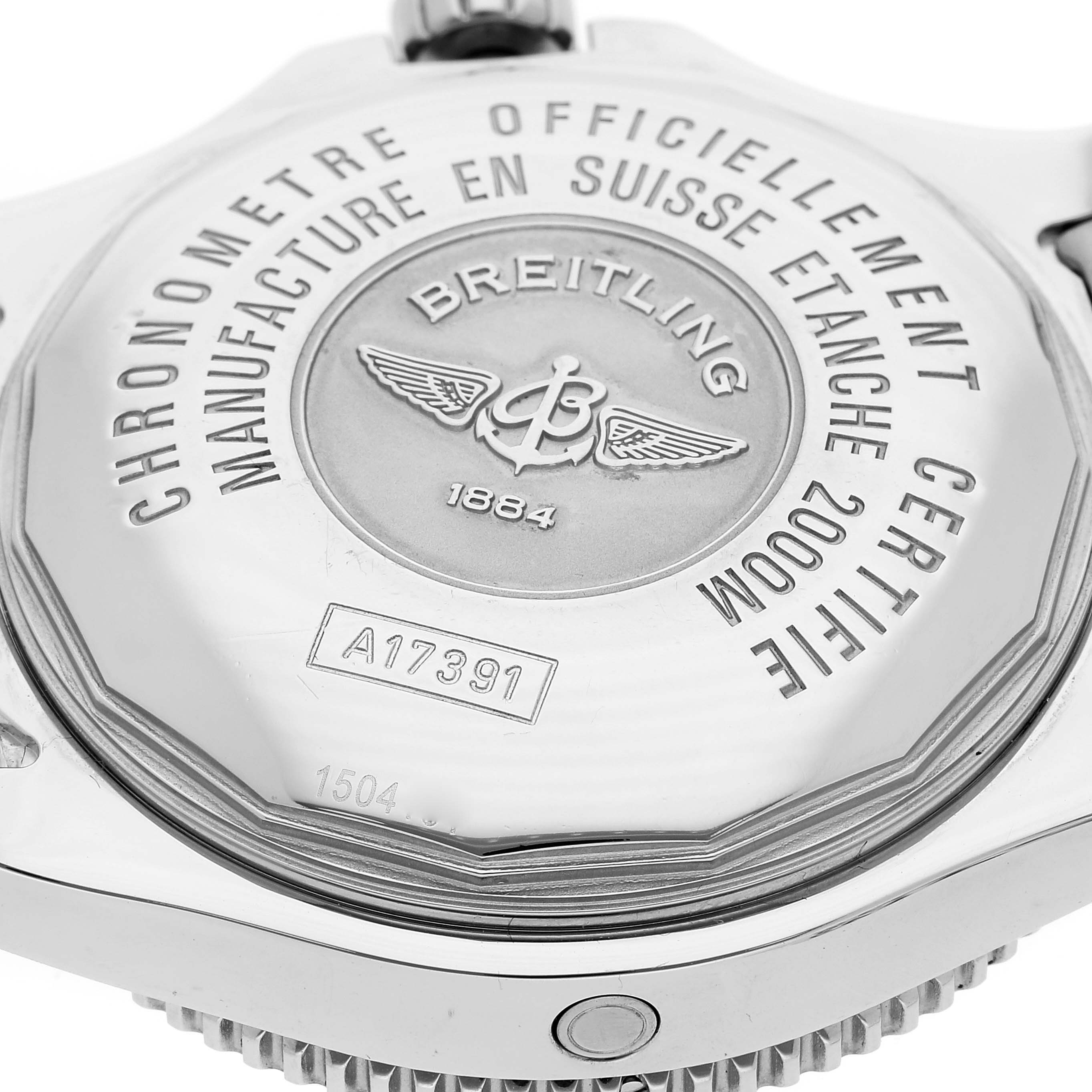 The image shows the case back of a Breitling Superocean A17391 Men's Stainless Steel Black Dial A17391 Men's Stainless Steel Black Dial watch, highlighting inscriptions and logos.